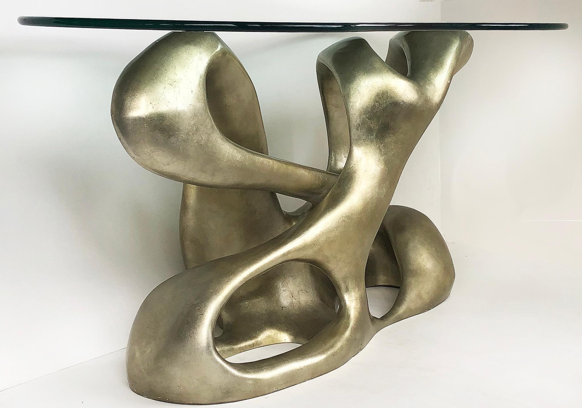 Tony Duquette for Baker Biomorphic console, silver leaf finish

Offered for sale is the Biomorphic console for Baker by Tony Duquette. This sculptural console is truly a work of art that was originally designed for the Charles and Palmer Ducommun