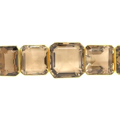 Tony Duquette Bracelet spectaculaire de grande taille en plaqué or avec topaze fumée