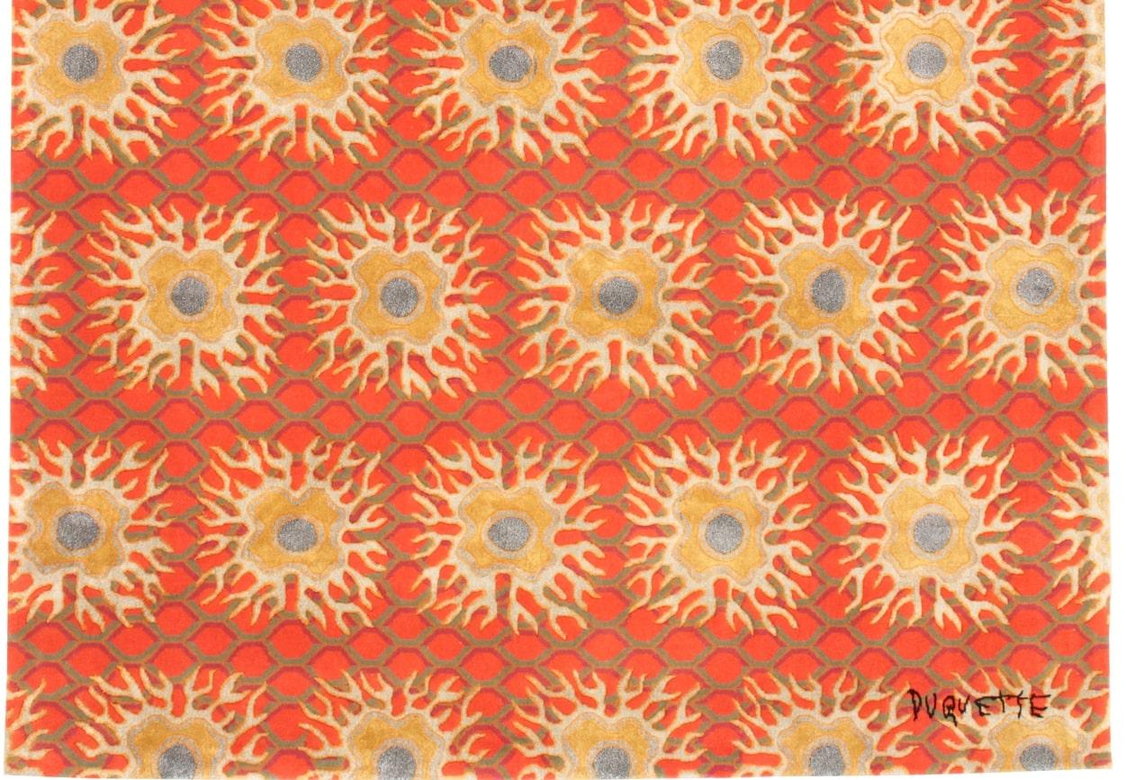 Tony Duquette - 'Tibetan Sun' Rug 6' x 9'
Material: 70% Wool and 30% Silk

â€œBeauty not luxury, is what I valueâ€ was Tony Duquetteâ€™s refrain. Hutton Wilkinson provided Viacomo Rugs with designs from the notable archives of the legendary
