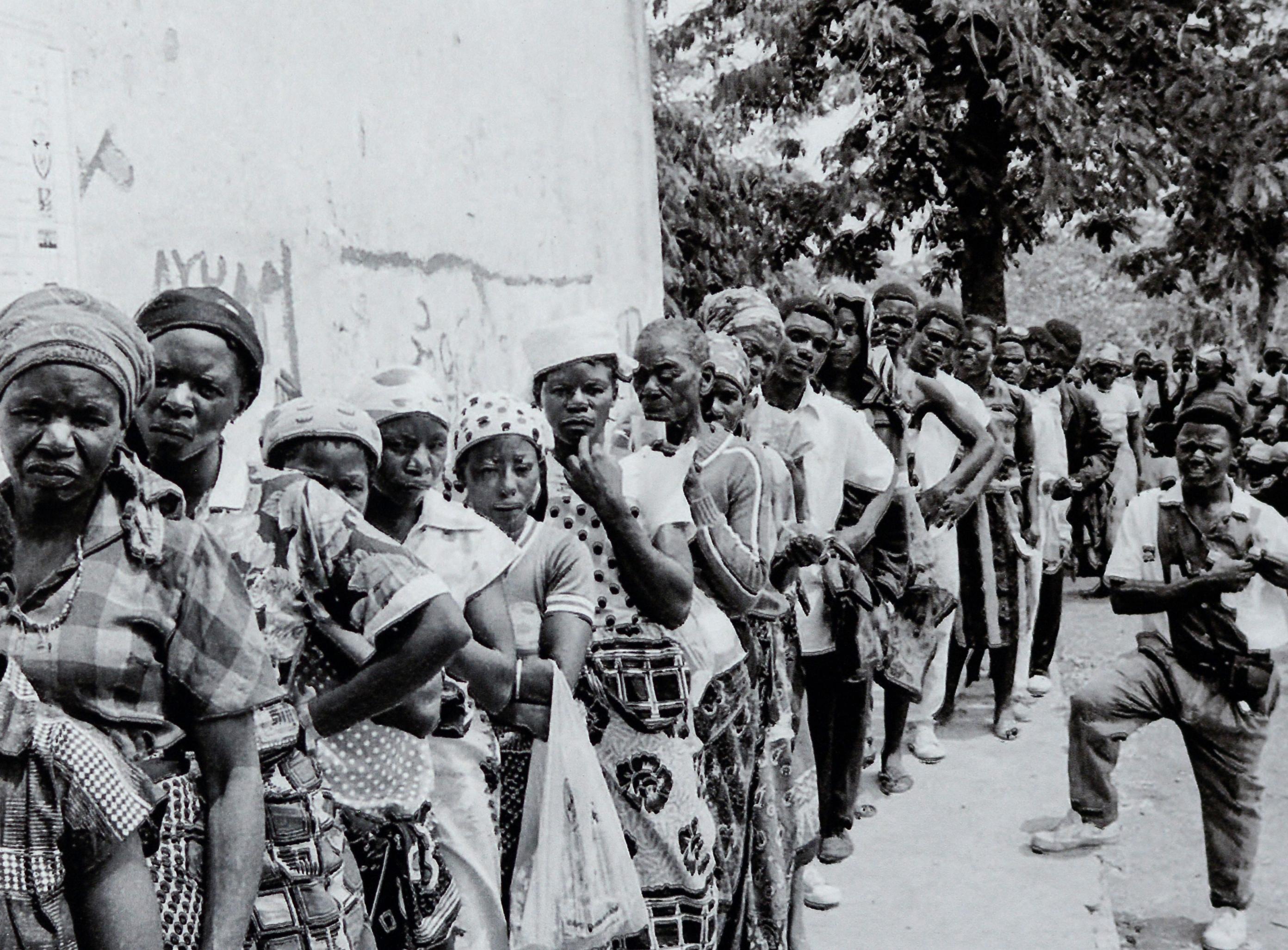 Angola Votes, c. 1992 (printed c. 2014). Inkjet Print on Hahnemuhle Fine Art Baryta Satin Paper, 1/1

Tony Figueira (1959 – 2017)Tony Figueira was born in 1959 in Huambo, Angola. At the age of seven his family moved to Windhoek, Namibia. Figueira’s