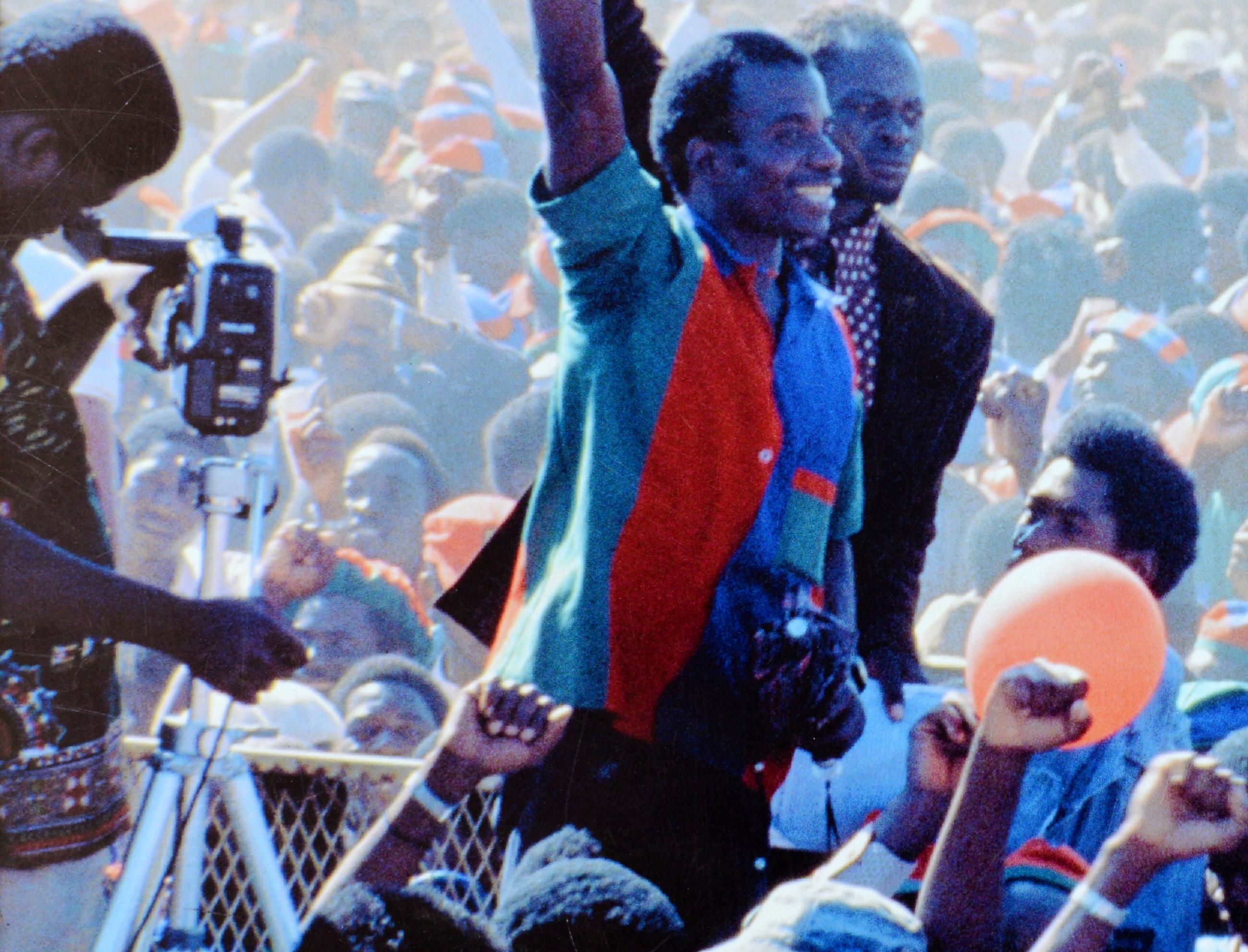 SWAPO Rally, c. 1989 (printed c. 2016). Inkjet Print on HP Invent Photo Paper, 1/1

Tony Figueira (1959 – 2017)Tony Figueira was born in 1959 in Huambo, Angola. At the age of seven his family moved to Windhoek, Namibia. Figueira’s passion for