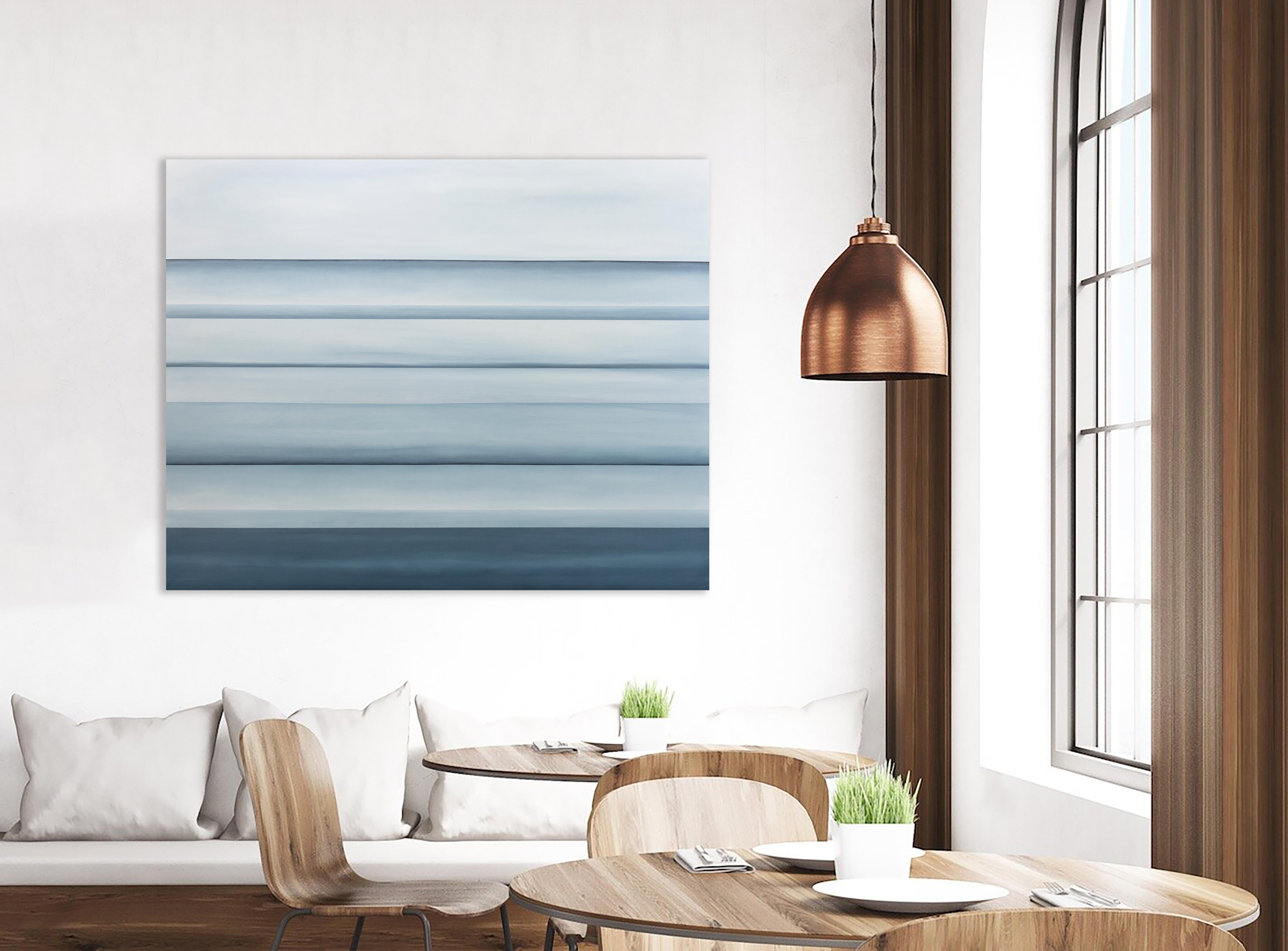 This abstract statement painting by Tony Iadicicco is made with oil paint on canvas and features a blue monochromatic palette. The painting has an abstracted landscape composition, with stark horizon lines running through the canvas and soft blue