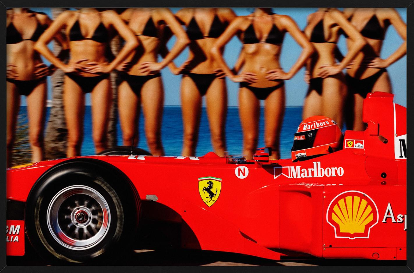 Tribuna - Ferrari di Formula 1 e modelle abbronzate, Fotografia Fine Art, 2024 - Photograph di Tony Kelly