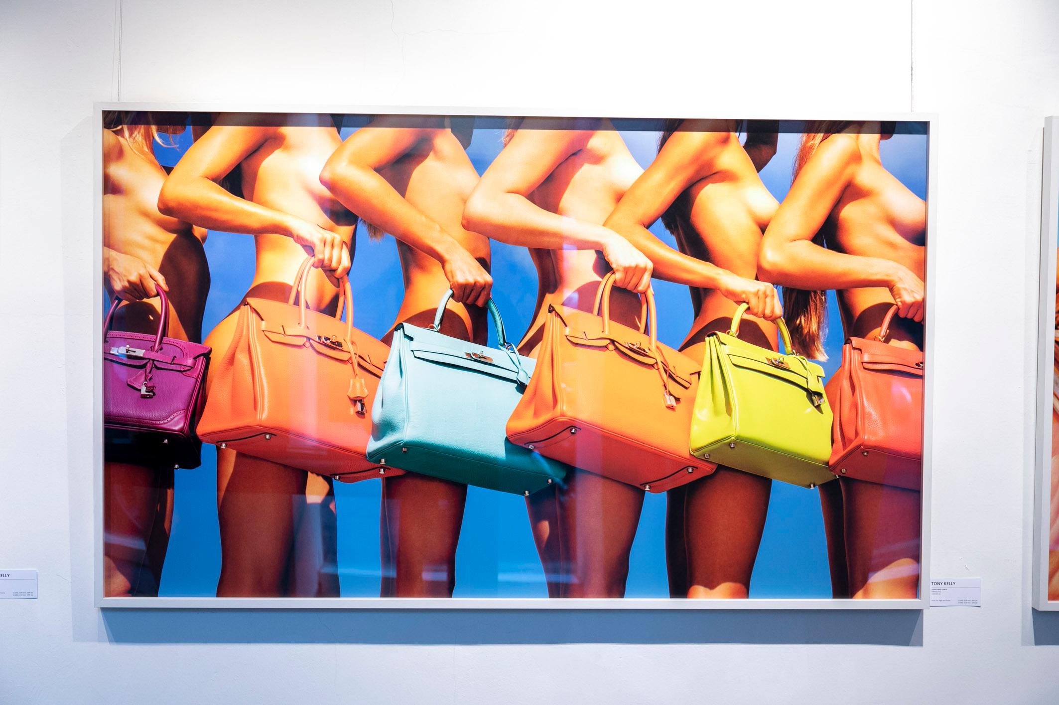 Ladies who lunch - colourfol nude portrait of models with Hermés Birkin bags. - Photograph by Tony Kelly