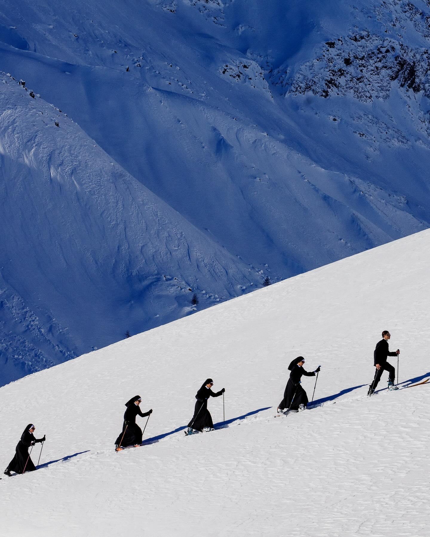 Tony Kelly Figurative Photograph - 'Saint Moritz' - A group of Nuns snowhiking, fine art photography, 2023