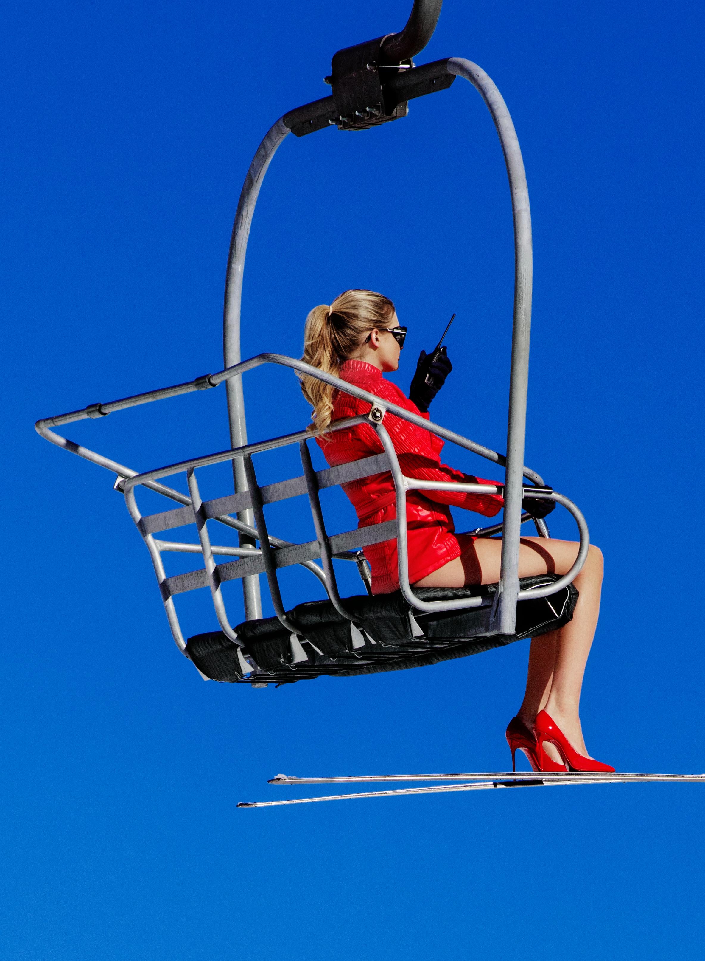 Ski Patrol - Model in Red sitting in a Chairlift, Fine Art Photography, 2019 For Sale 4