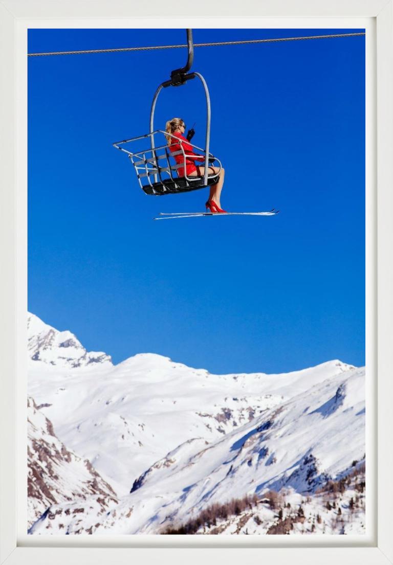 Model sitting in a Chairlift, wearing only a red Snowjacket and a pair of red High Heels attached to a pair of Ski, Photographed by Tony Kelly in 2019.

All prints are limited edition. Available in multiple sizes. High-end framing on request.

All