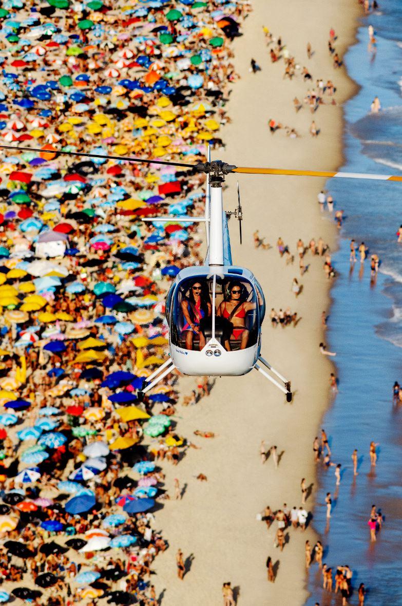 Tony Kelly Figurative Photograph - 'The Girls from Ipanema' - helicopter over beach in Rio, fine art photography 