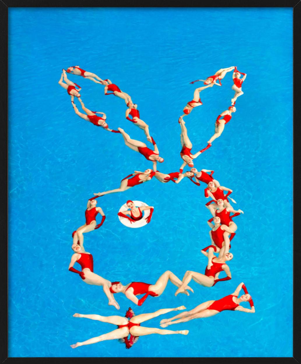 Water Beauties - Swimmers Forming a Playboy Bunny, Fine Art Photography, 2013 - Blue Color Photograph by Tony Kelly