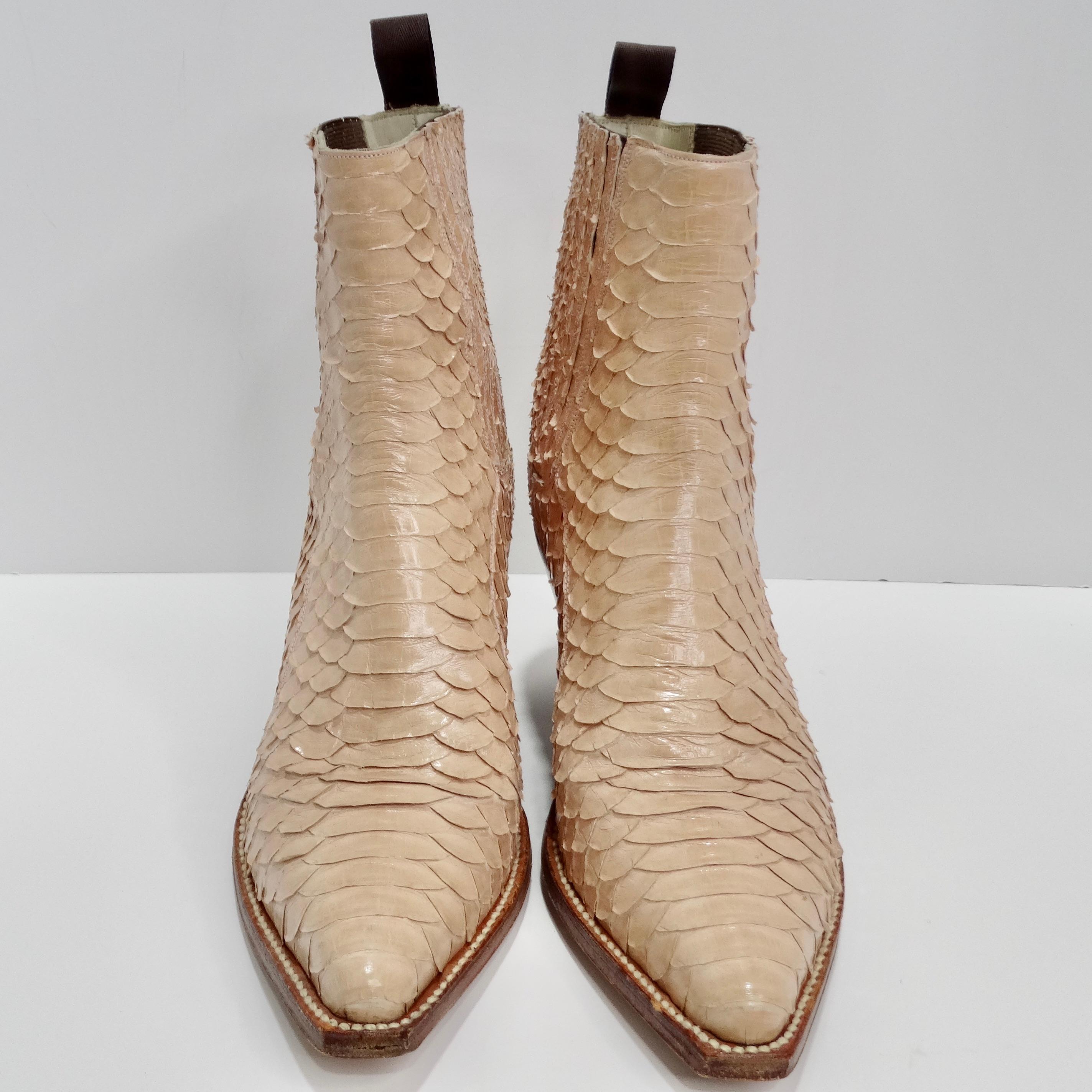Step into unparalleled luxury with the Tony Mora Beige Python Ankle Boots. These ankle boots are crafted from genuine beige python leather, exuding opulence and sophistication with every step. The unique texture and natural color variations of the