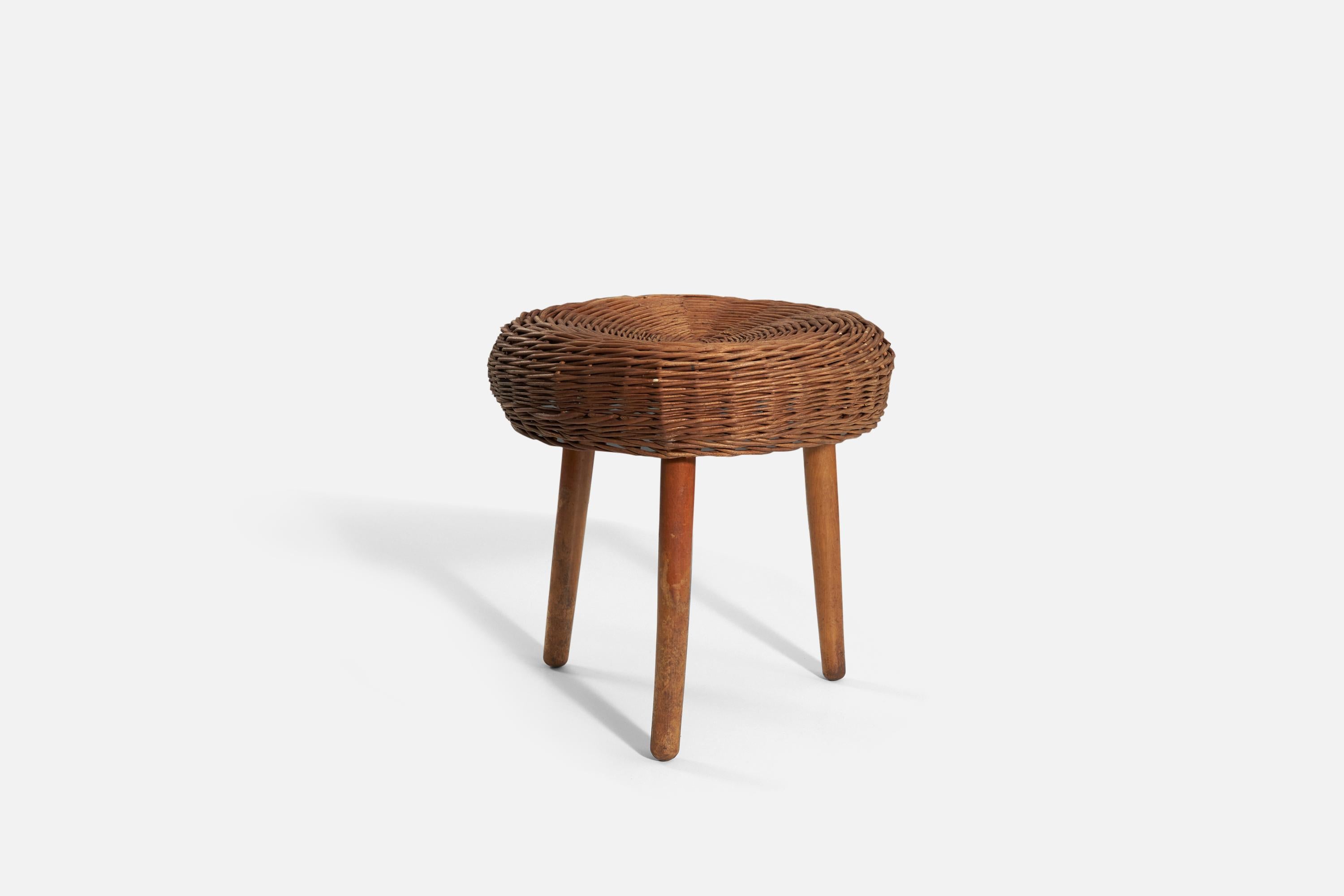 A wicker and wood stool attributed to Tony Paul, United States, 1950s.
 