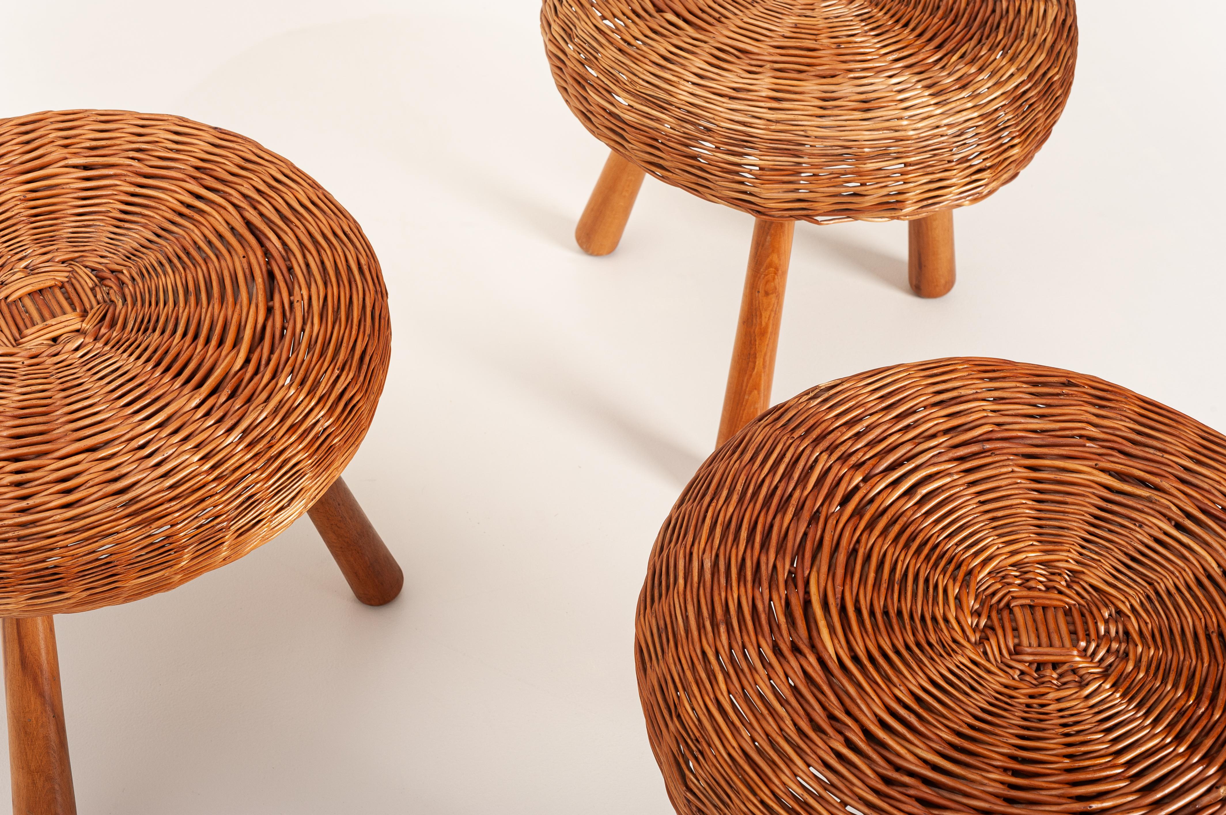 Set of three stools with a handwoven wicker top and solid beech legs attributed to the famous American designer Tony Paul.

Produced in the late 1950s these stools are in their original condition and refinished to last for the forthcoming years.