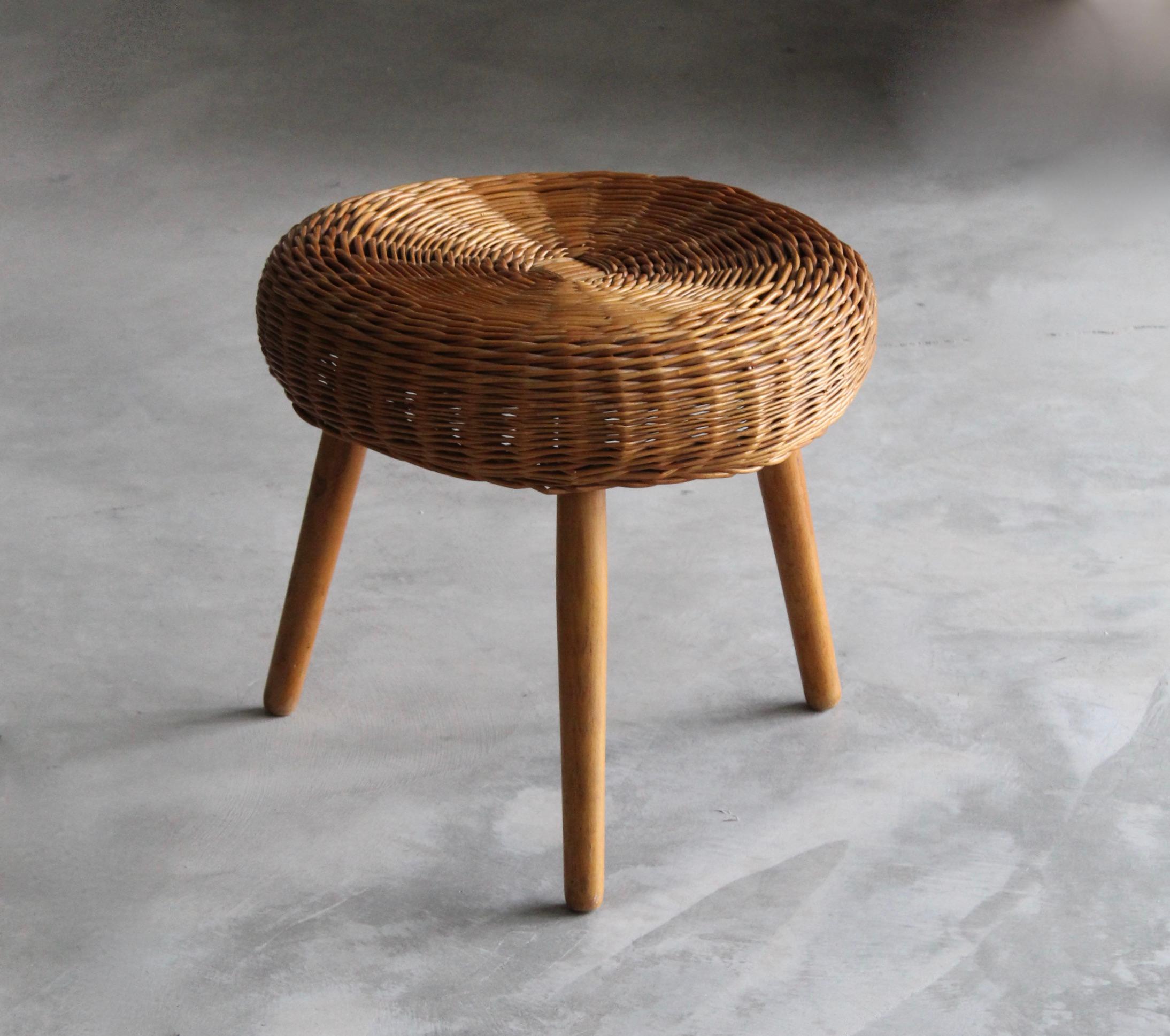 A stool, design attributed to Tony Paul. Features a mix of rattan and finely carved solid wood.

Other designers of the period include Charlotte Perriand, Pierre Chapo, Isamu Noguchi, Eero Arnio, and Sori Yanagi.
