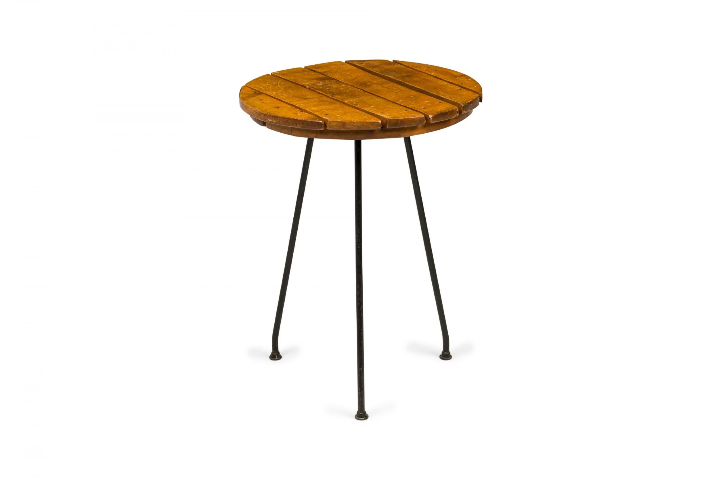 American Tony Paul Circular Wooden Slat Top and Iron Leg End / Side Table For Sale