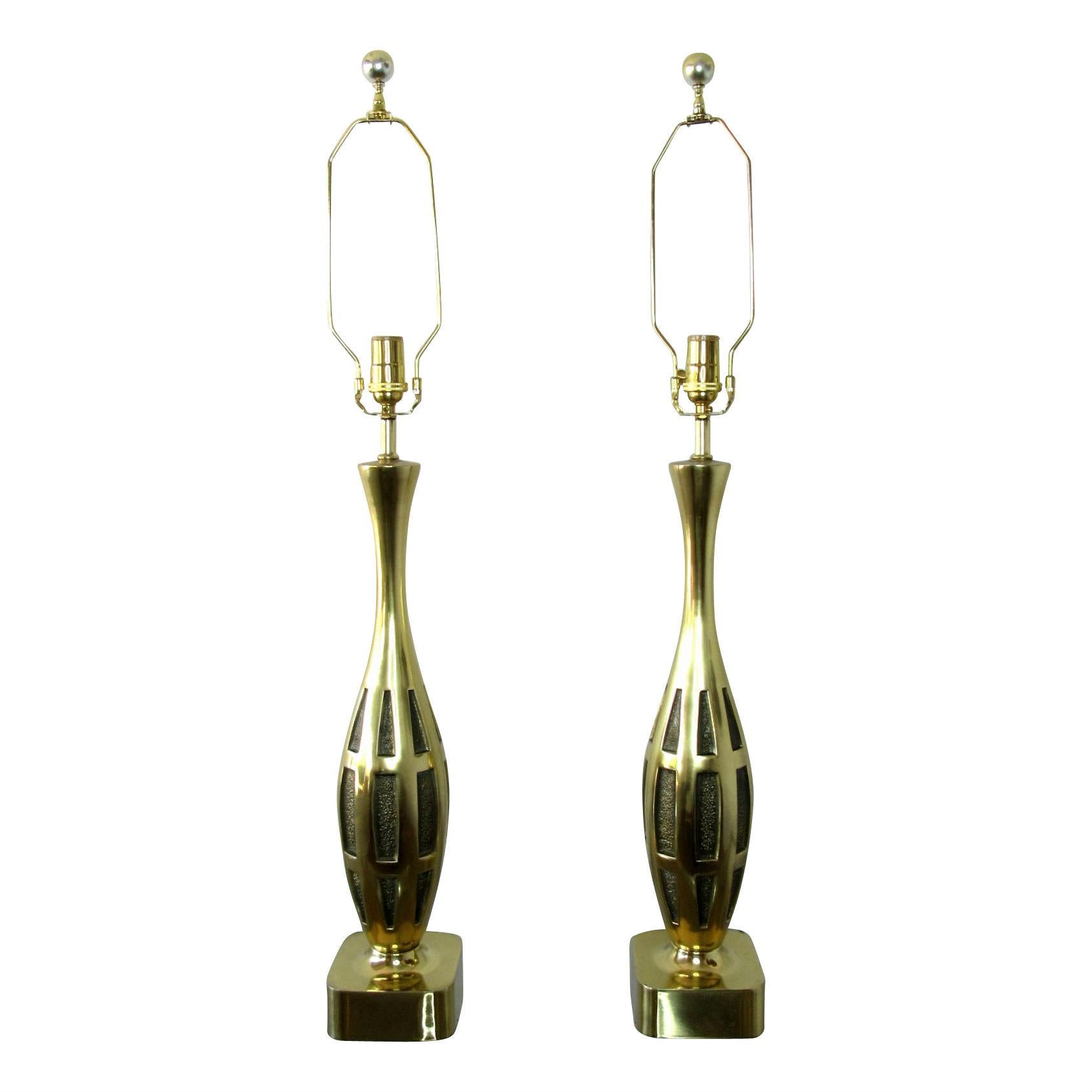 Fantastic pair of Midcentury Modern brass table lamps designed by Tony Paul for Westwood Lighting. 
Rewired for use in the USA.