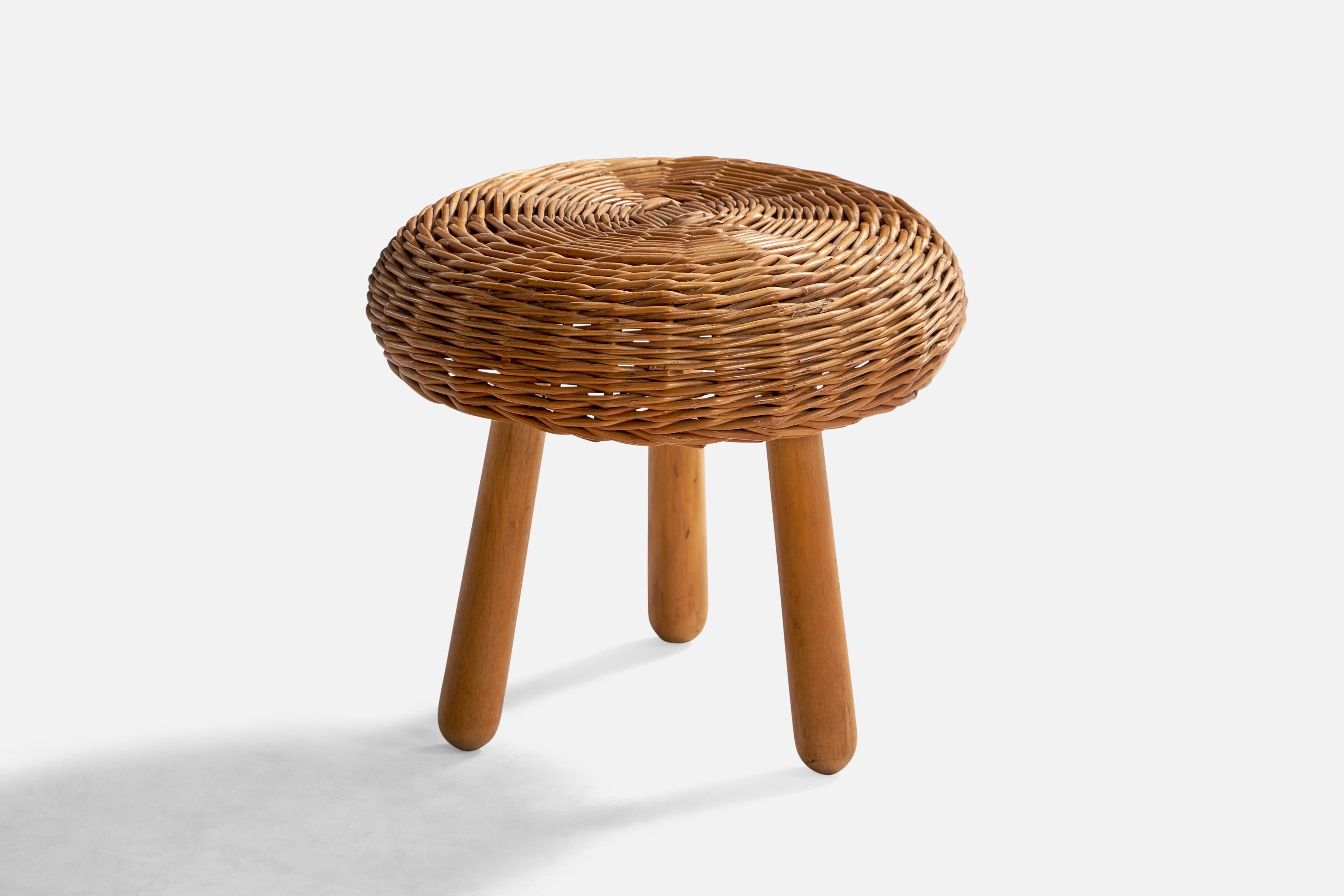 A woven rattan and wood stool designed and produced by Tony Paul, USA, 1960s.

Seat height: 10.75”