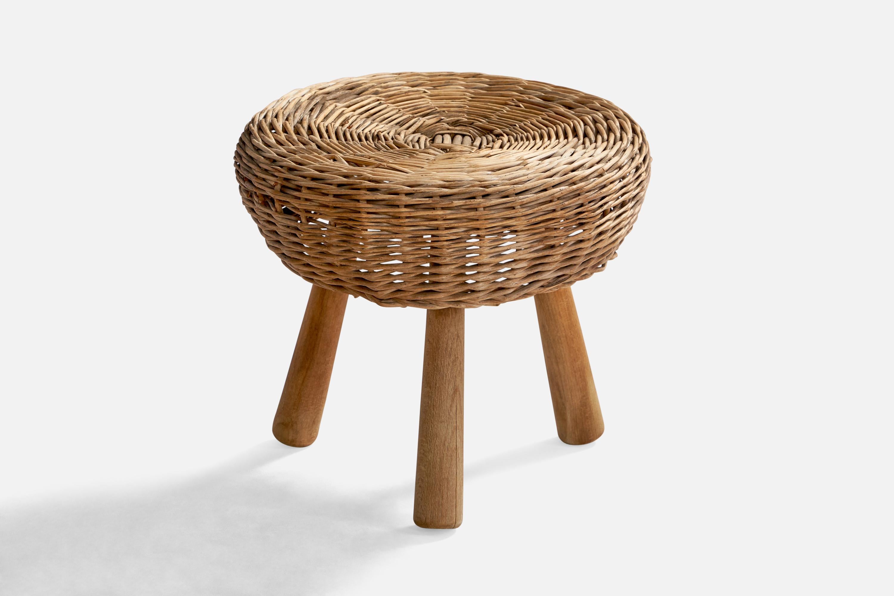 A woven rattan and wood stool designed and produced by Tony Paul, USA, 1960s.