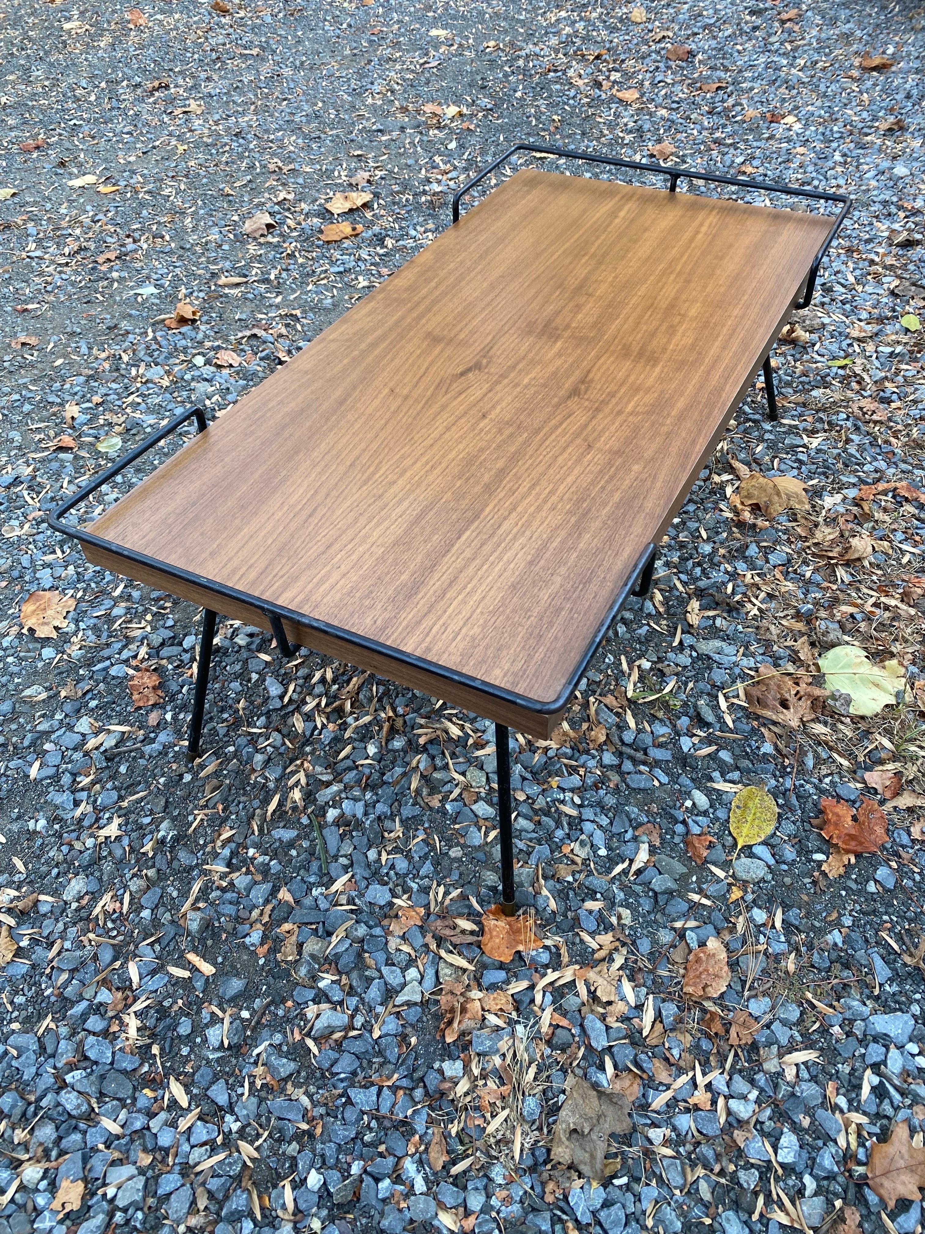 Tony Paul Style Coffee Table.  Iron Frame with new Walnut Top.  Iron wraps around Coffee table that works to keep things from rolling off and as a design element!  Matching pair of End Tables available separately!