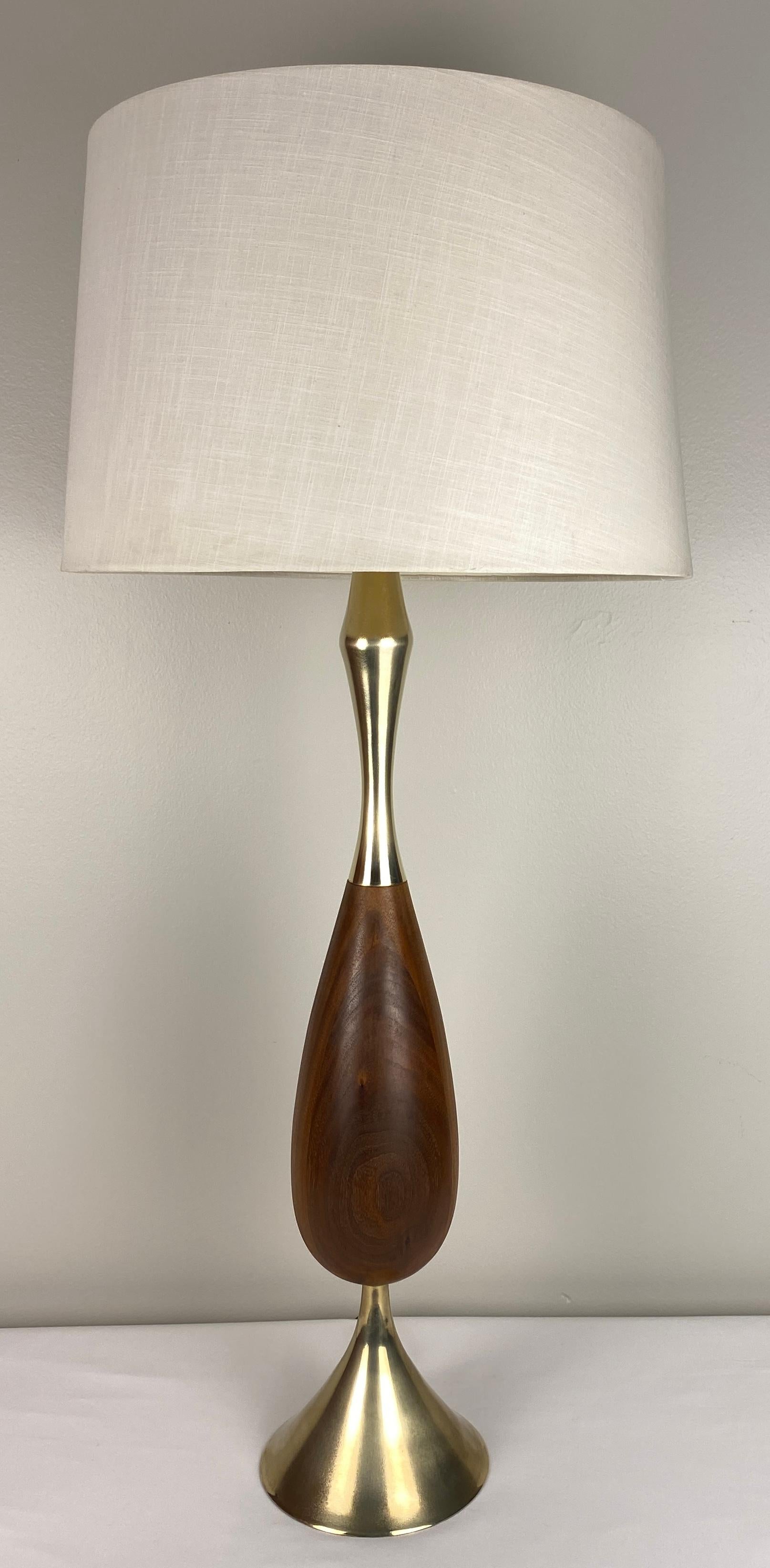 A very stylish table lamp by Tony Paul. 

Tony Paul was a world famous American industrial designer. Above all, he is known for his designs of furniture, dishes and lighting design.

Tony Paul grew up in the Bronx and lived in New York for his