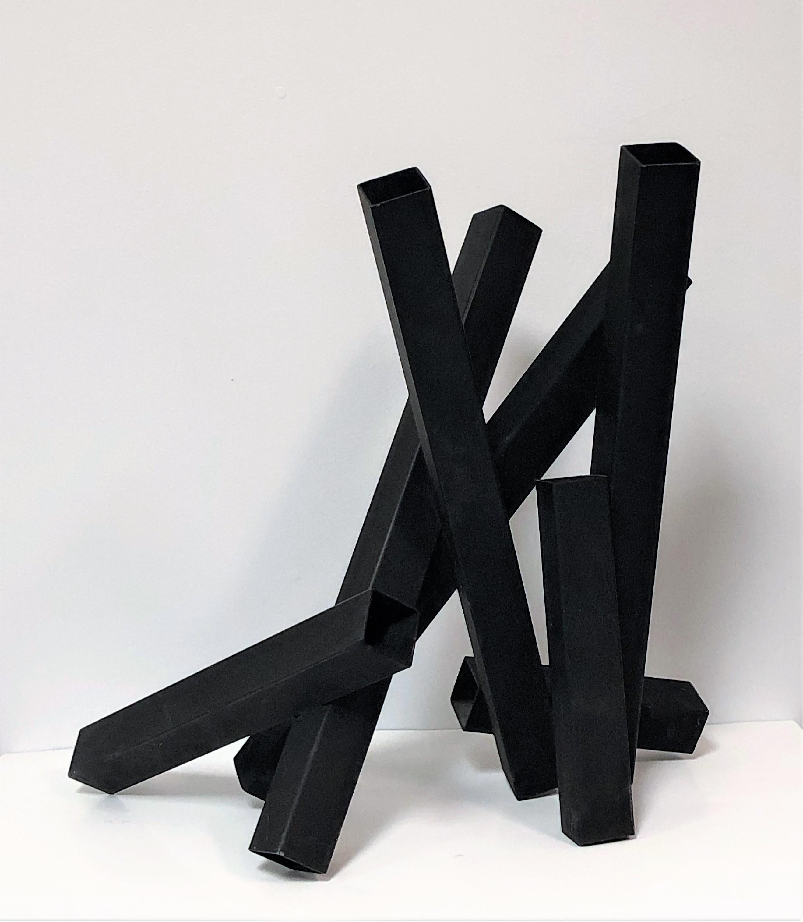 A steel sculpture with a black enamel finish. Nice size, could be displayed on a pedestal, on top of a table or on the floor.