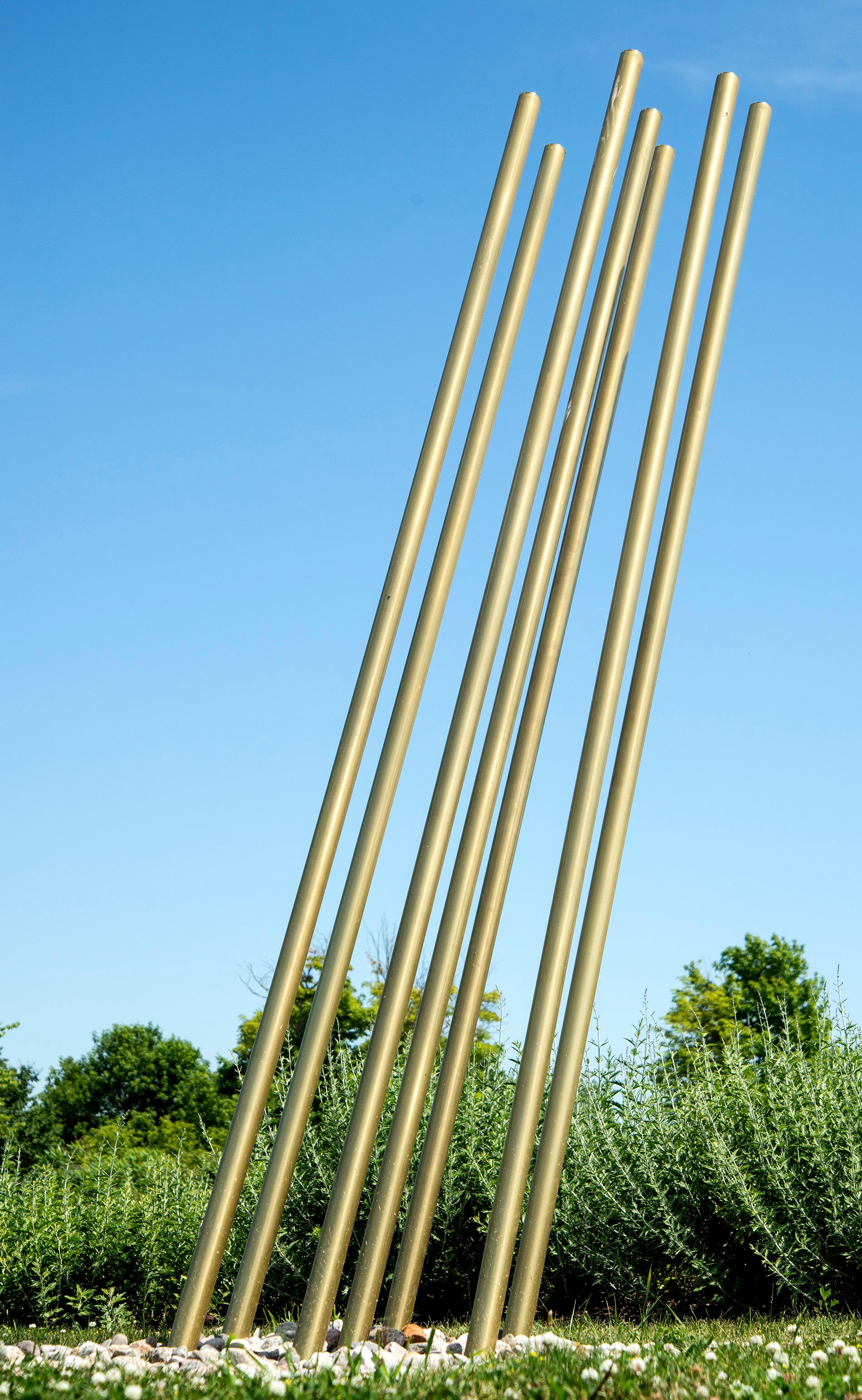 Tonya Hart Abstract Sculpture - Hotspot - large, tall, dynamic, polished, brass coated, steel outdoor sculpture
