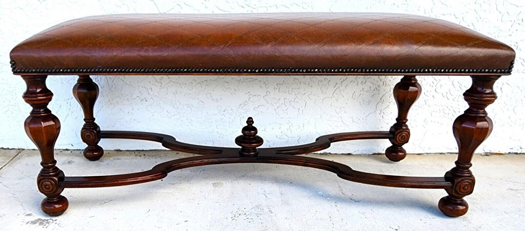 Offering one of our recent Palm Beach estate fine furniture acquisitions of a
Tooled leather bench by Theodore Alexander

Approximate measurements in inches
21.5