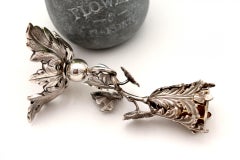 Toothpick holder with chalice on a silver vase