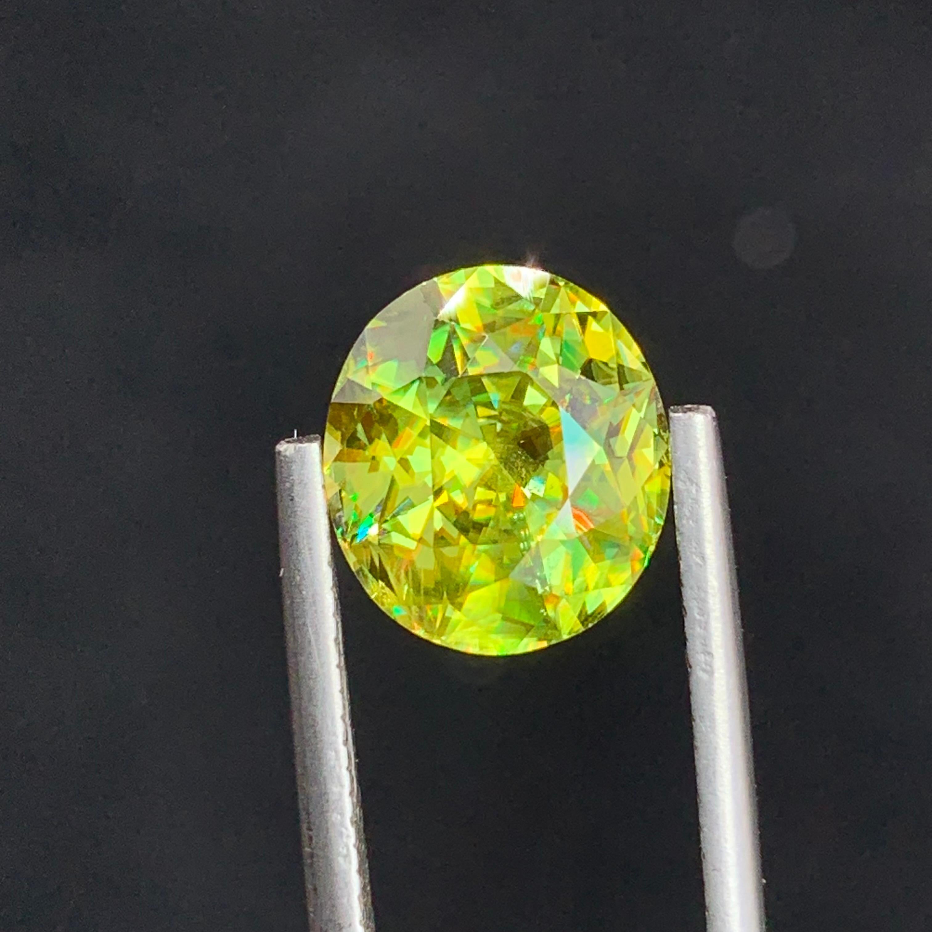 Top AAA Quality 4.45 Carat Natural Loose Fire Sphene Titanite Oval Shape Gem  For Sale 1