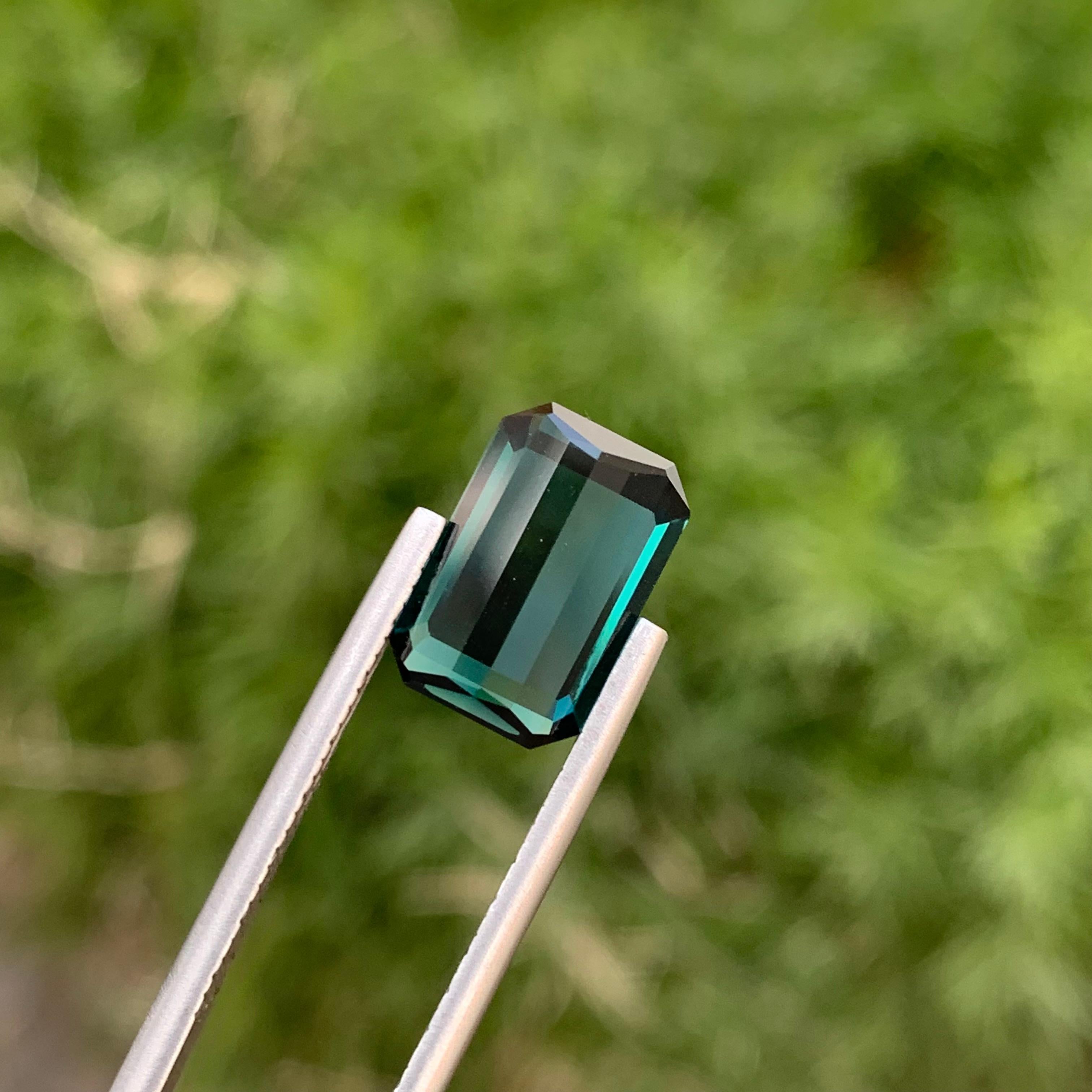 Indicolite Tourmaline 
Weight: 4.45 Carats 
Dimension: 12.1x8x5.4 Mm
Origin: Kunar Afghanistan 
Shape: Emerald 
Color: Blue
Treatment: Non
Certificate: On Customer Demand 
Indicolite, a mesmerizing variety of tourmaline, captivates with its stunning