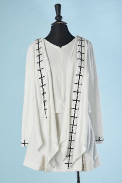 Top and mini skirt ensemble in branded CC cotton and sequin Chanel Cruise 2023