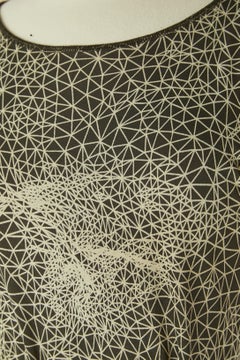 Top and skirt ensemble with abstract print and green  belt JEAN-PAUL GAULTIER