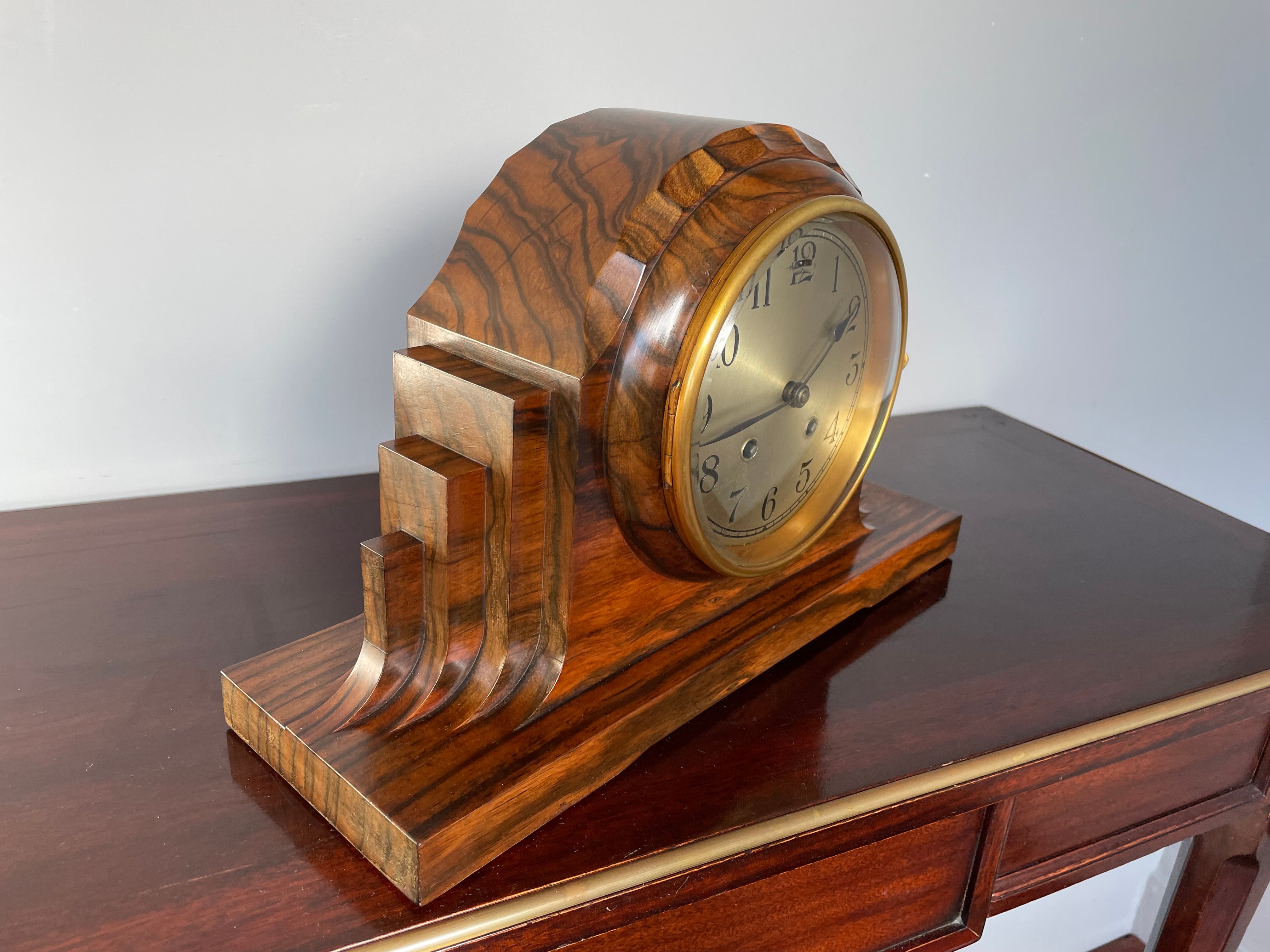 Unique and stunning Art Deco mantel clock.

For most people that were born after, say 1980, it is hard to believe that in the earliest years of the twentieth century a variety of craftsman were still hand-creating unique items. This included