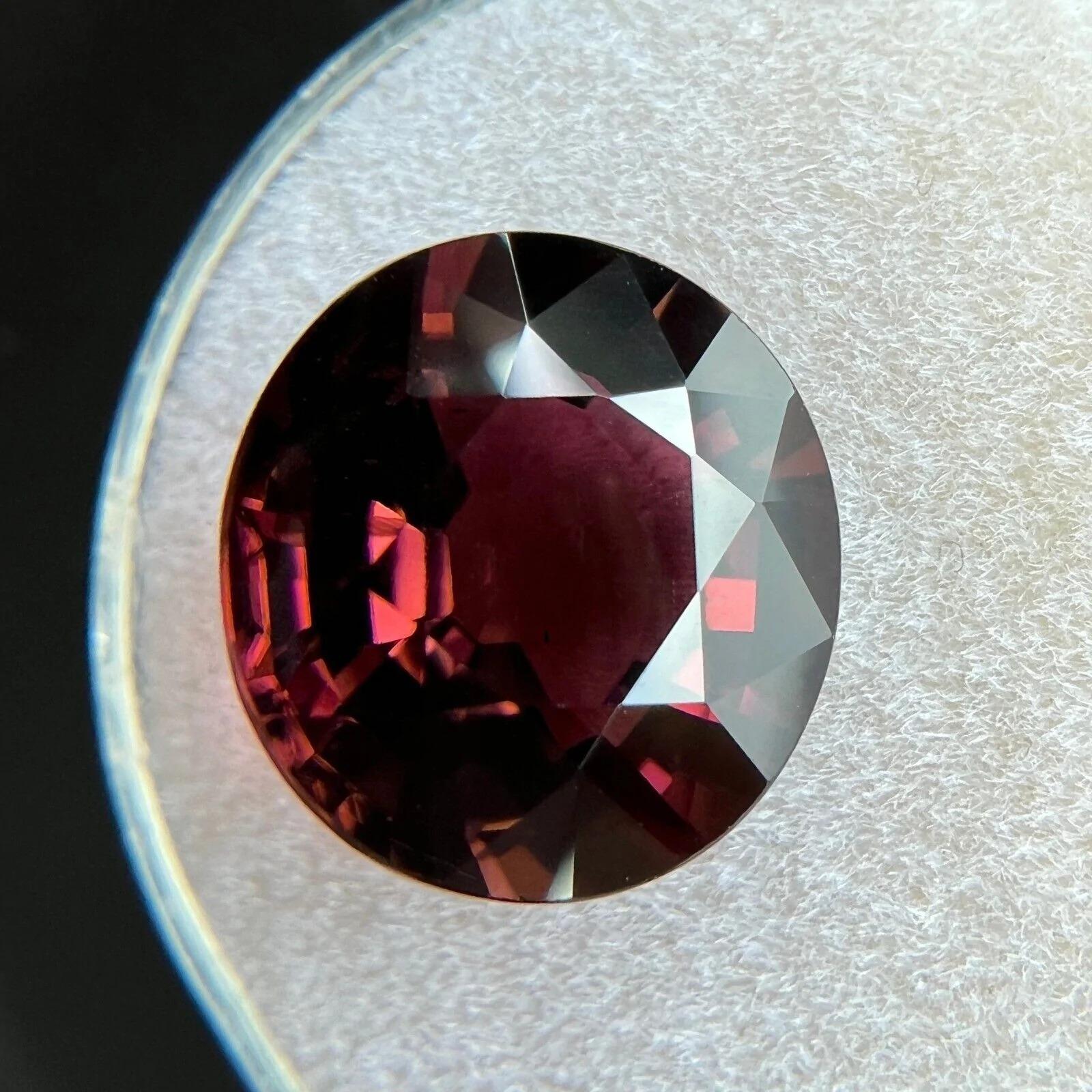 Top Grade 6.64ct GIA Certified Natural Tourmaline Red Purple Untreated Round Cut

Rare Untreated Purple Red Tourmaline Gemstone. 
Large 6.64 carat tourmaline with a beautiful reddish purple colour. Fully certified by GIA confirming stone as natural.