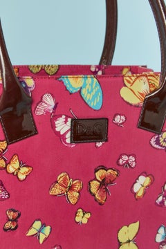 Top handle bag in coated cotton with butterfly print D&G by Dolce & Gabbana