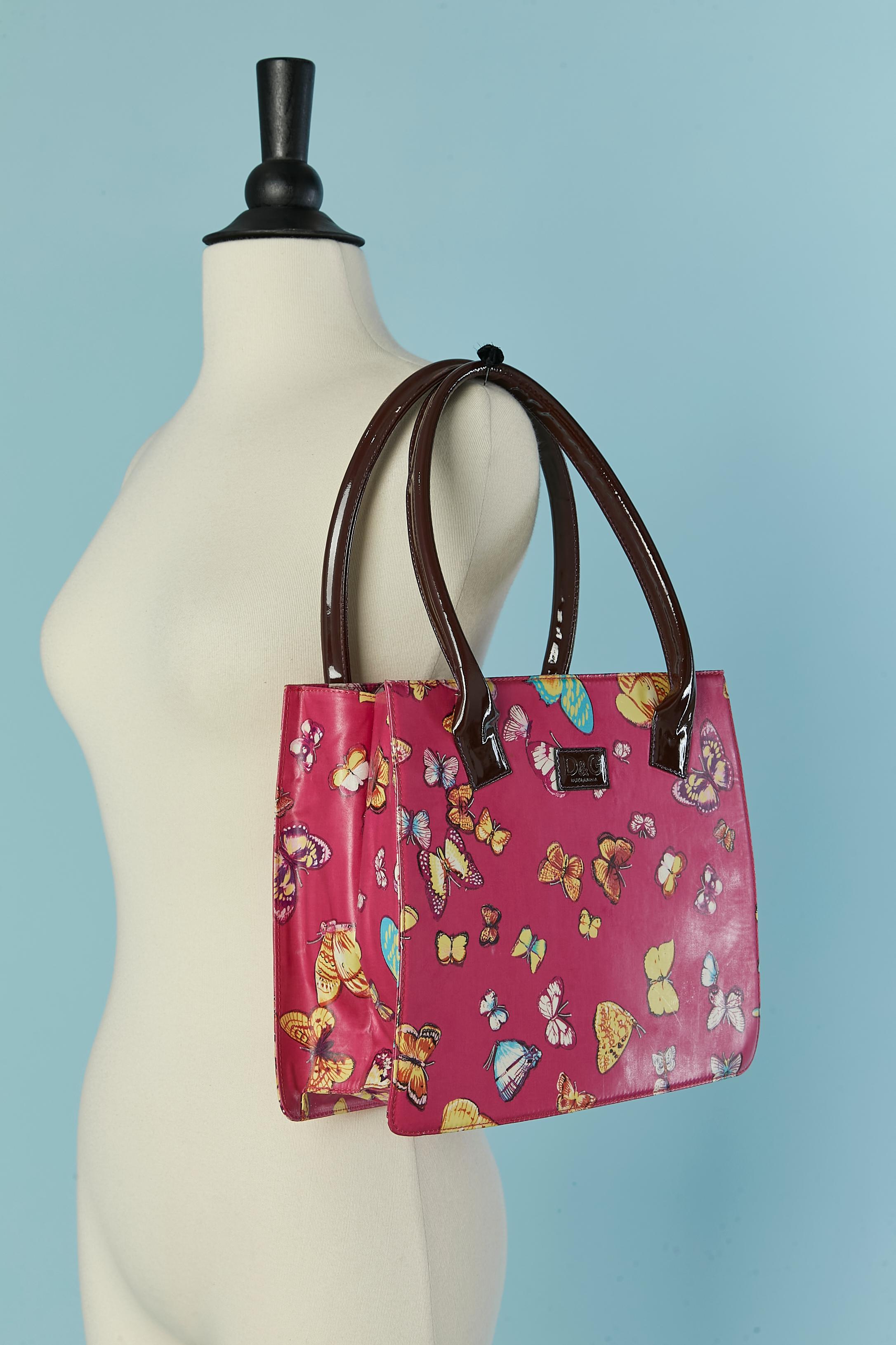 Donna Borsa con manico superiore in cotone spalmato con stampa di farfalle D&G by DOLCE & GABBANA in vendita