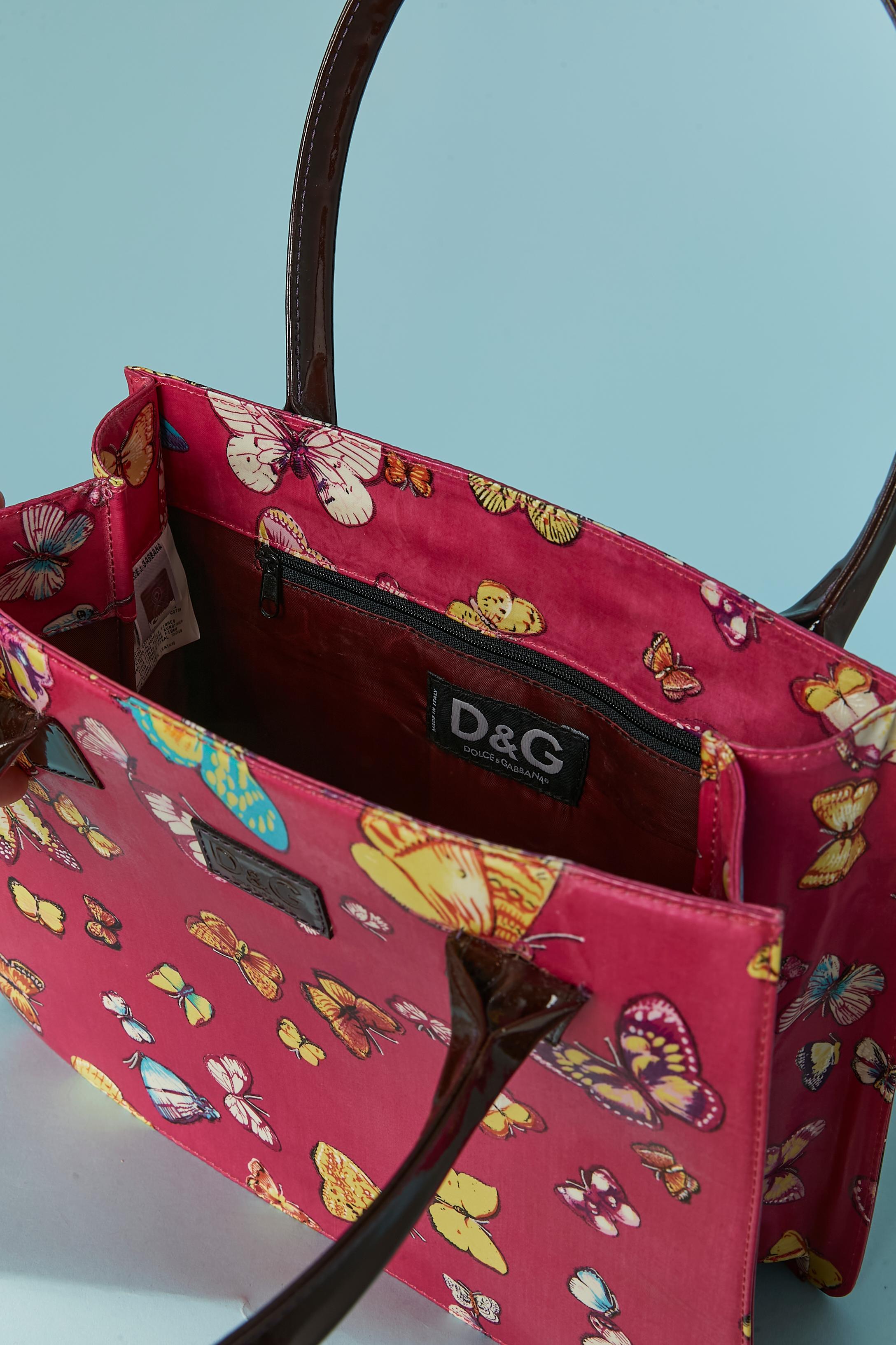 Borsa con manico superiore in cotone spalmato con stampa di farfalle D&G by DOLCE & GABBANA in vendita 1