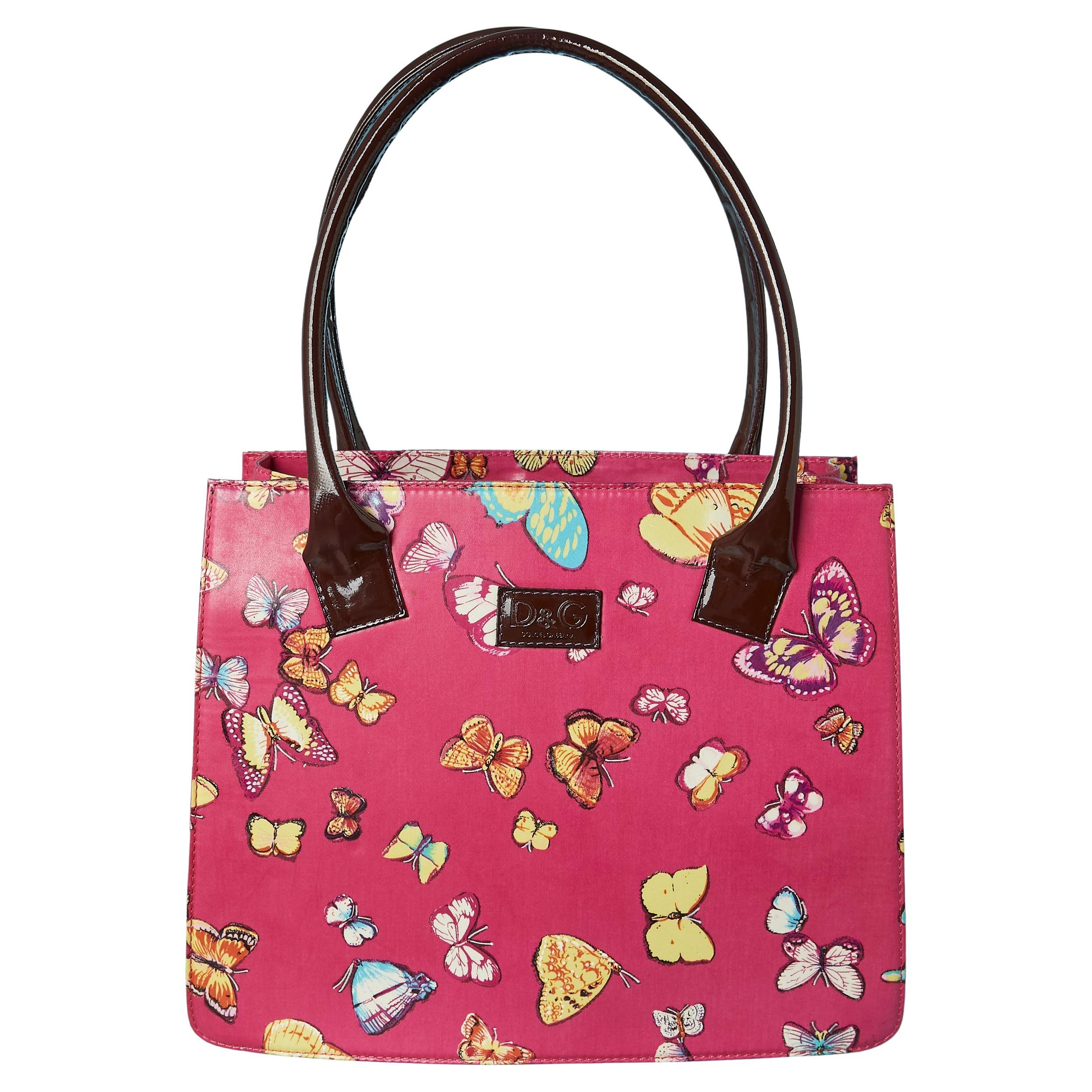 Borsa con manico superiore in cotone spalmato con stampa di farfalle D&G by DOLCE & GABBANA in vendita