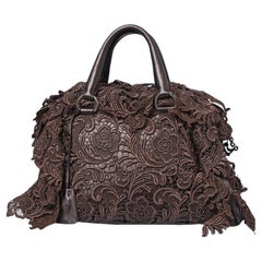 Borsa con manico superiore in guipure marrone su base in pelle Prada