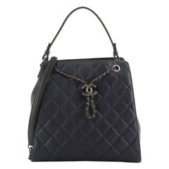 Top Handle CC Drawstring Bucket Bag Quilted Caviar Medium