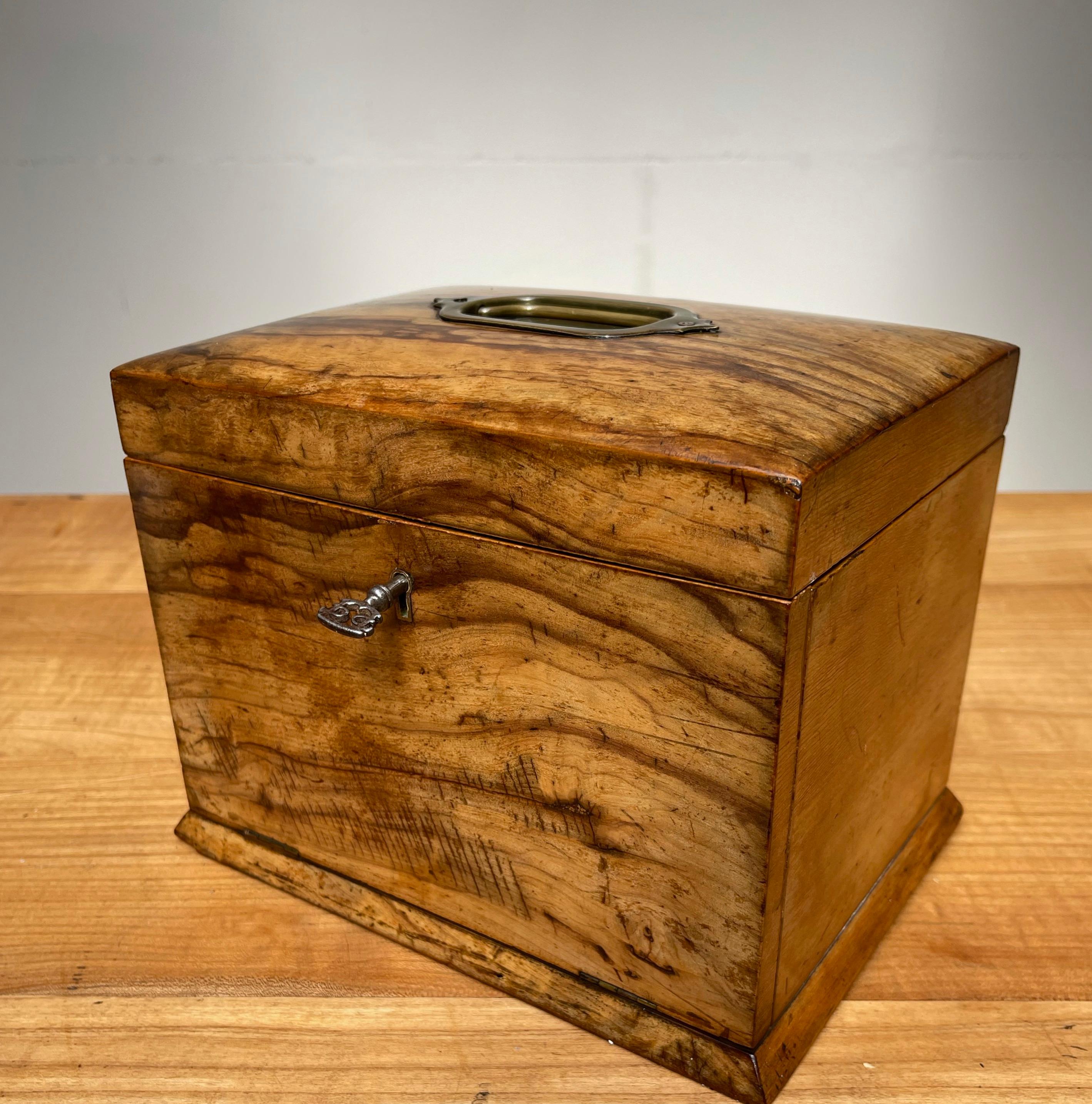 A beautiful antique and all handcrafted jewelry box with a fine and padded interior.

This rare and practical size jewelry box makes a beautiful accessory for a lady with an eye for fine arts. It is a very well made gem and highly practical with two