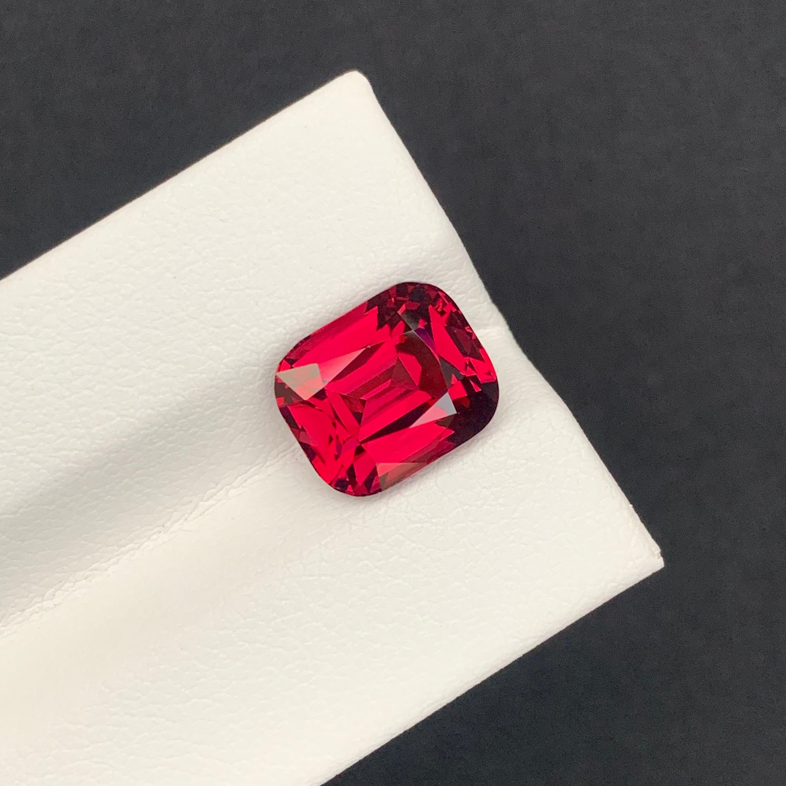 Loose Rhodolite Garnet 

Weight: 5.65 Carats
Dimension: 10.3 x 8.6 x 6.6 Mm 
Colour: Red
Origin: Africa
Treatment: Non
Shape : Cushion 
Clarity: Loupe Clean 

Rhodolite garnet, a gemstone celebrated for its enchanting reddish-purple hues, occupies a