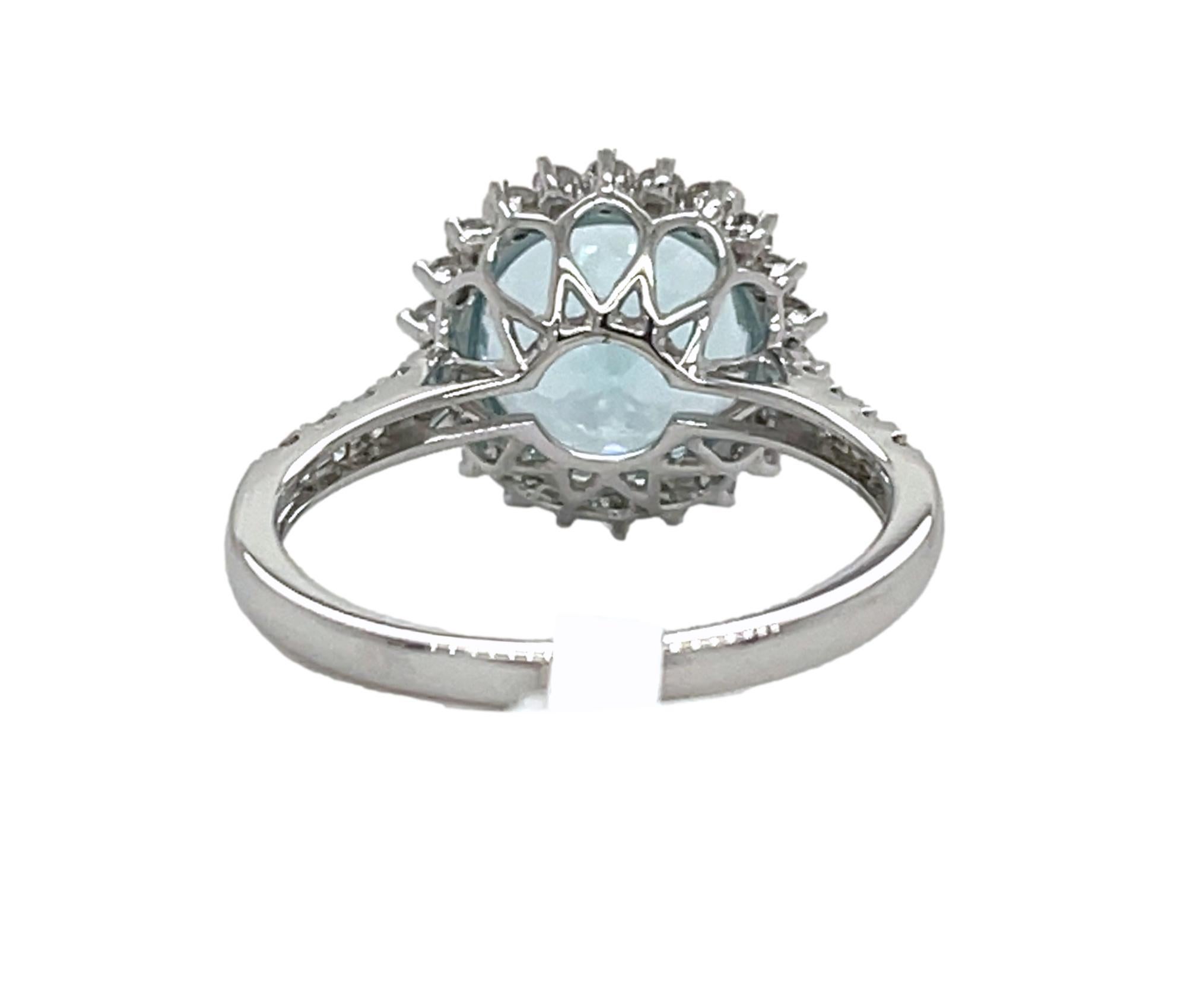 Aquamarine and Diamond Halo Ring in 14KW Gold In New Condition For Sale In New York, NY