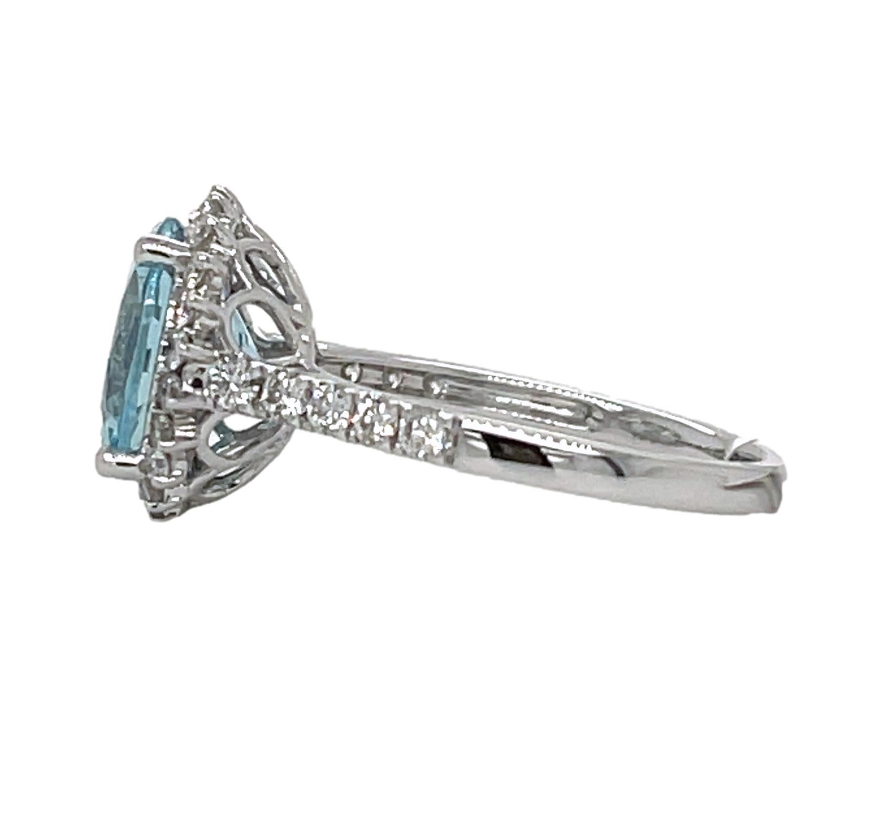 Women's Top Quality Aquamarine Halo Ring in 14KW Gold