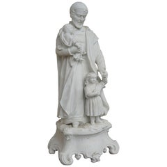 Antique Top Quality Bisque Porcelain Sculpture of Saint Vincent de Paul with Children