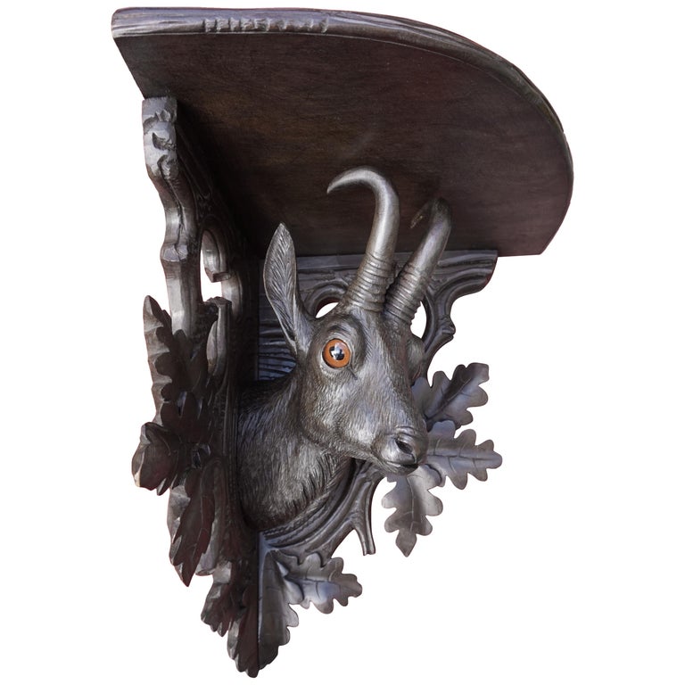 Top Quality Carved Antique Swiss Black Forest Linden Wood Ibex Corner Shelf For Sale at 1stDibs