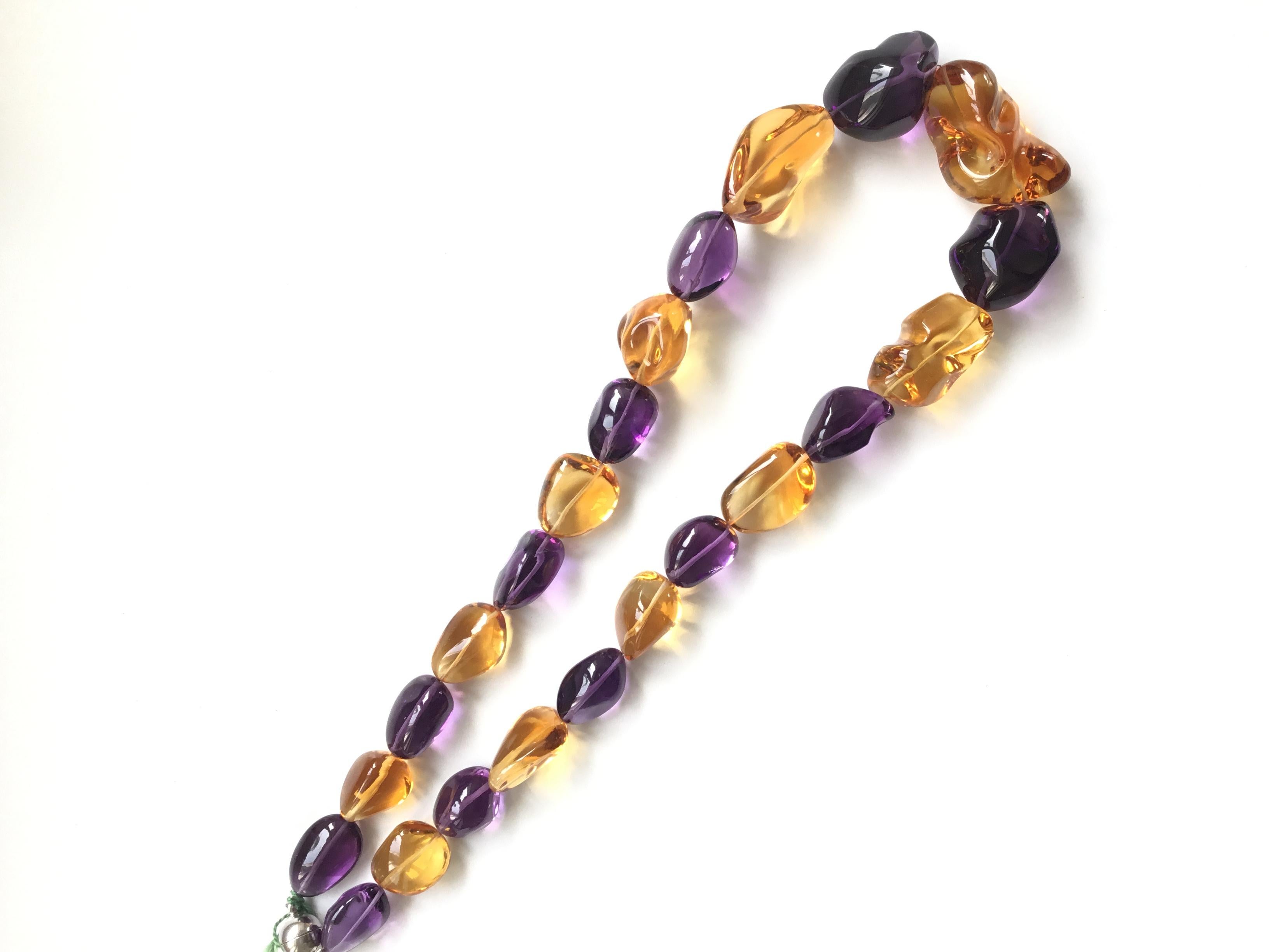 Top Quality Citrine & Amethyst Plain Tumbled Natural Gemstone Necklace
Size : 19x14 37x19 MM Beads
Weight : 764.35 Carats
Length Of Necklace : 18 Inches