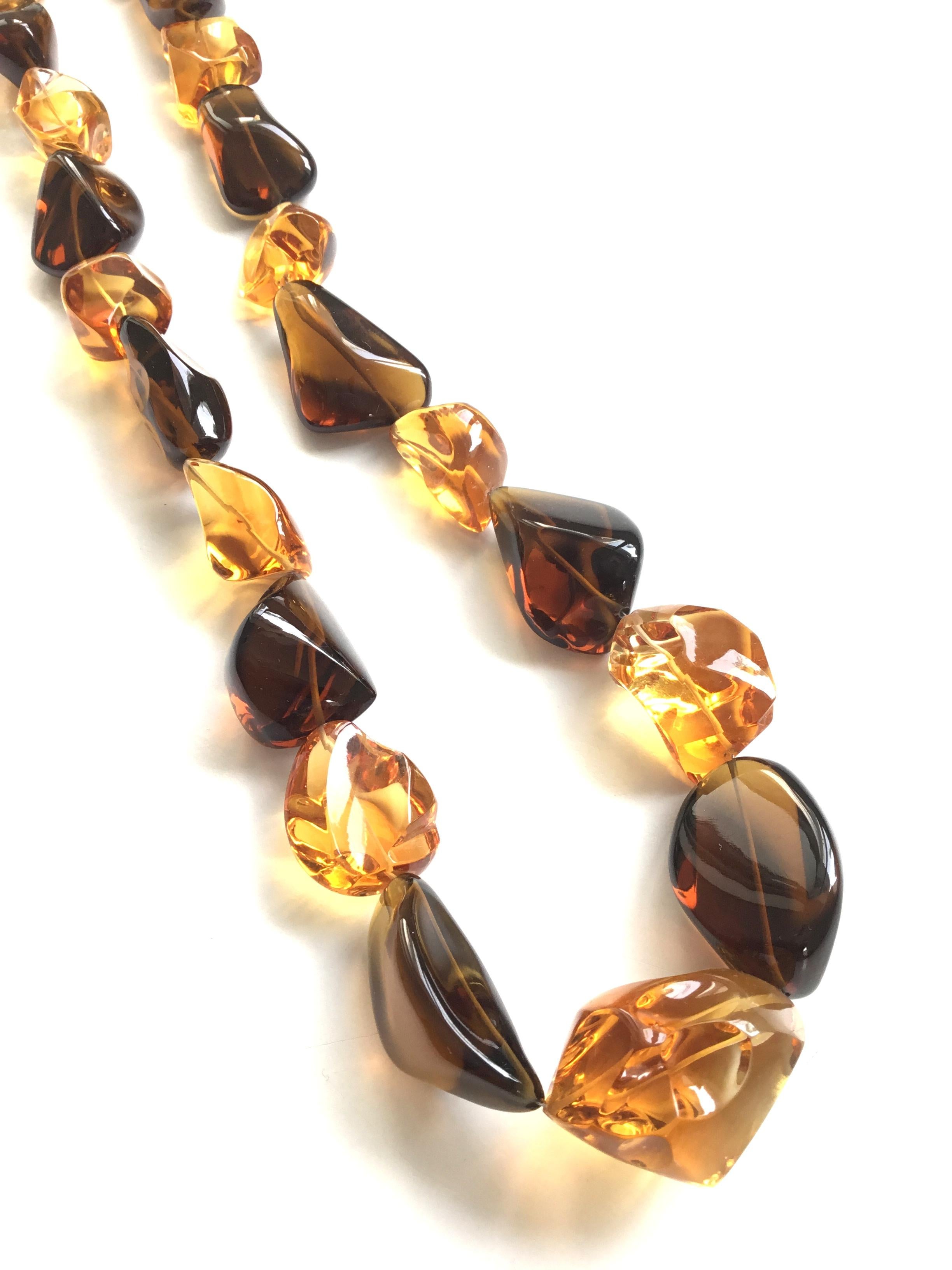 Top Quality Citrine & Beer Quartz Plain Tumbled Natural Gemstone Necklace 
Size : 15 X 17 To 25 x 33 MM Beads
Weight : 891.55 Carats
Length Of Necklace : 18 Inches