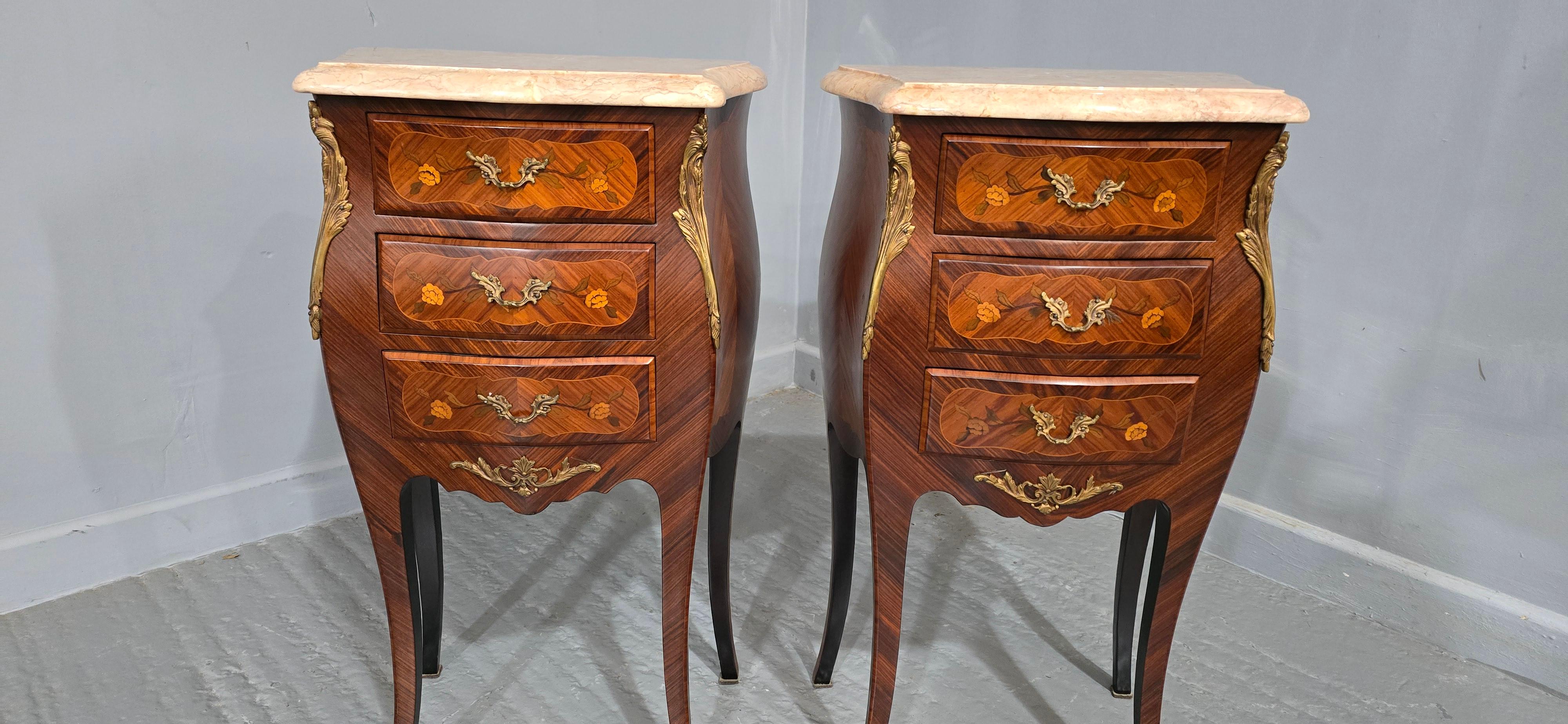 A very nice pair of French tulipwood and ormolu mounted  three drawer bedside lamp chests of drawers with wonderful marble tops, excellent overall colour and condition.

29
