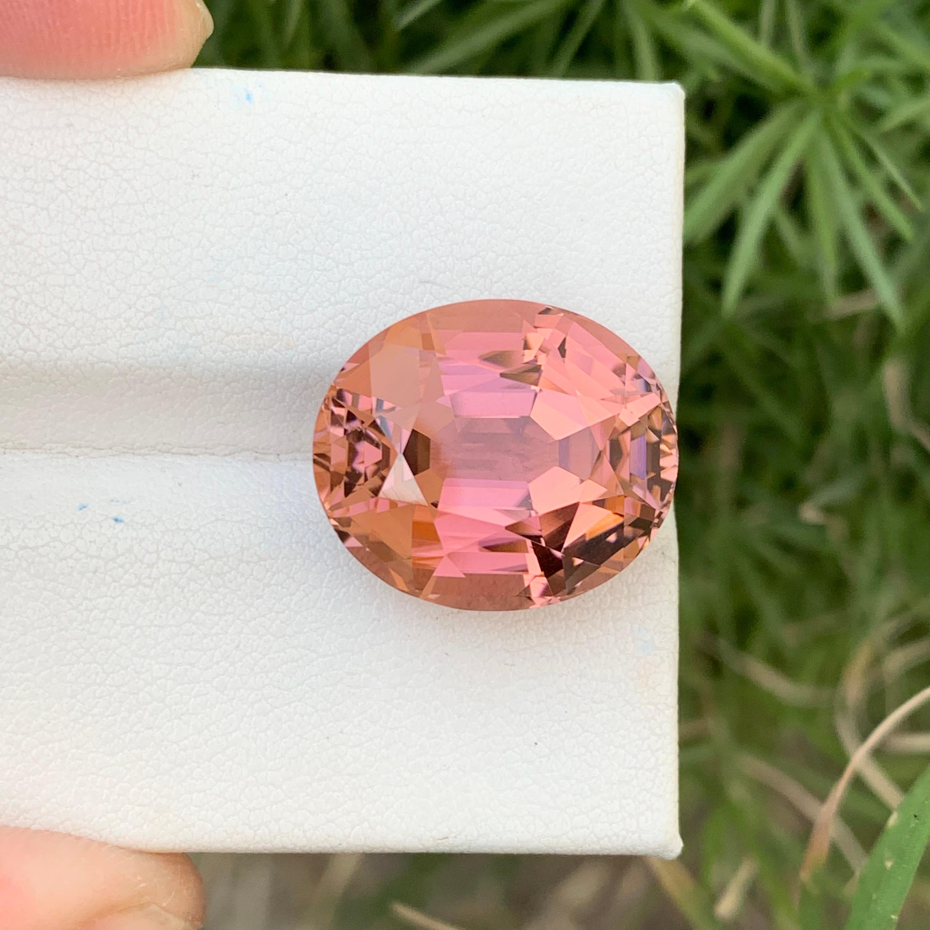 Arts and Crafts Top Quality Peach Color Loose Tourmaline Oval Shape 21.40 Carats Afghani Mine For Sale
