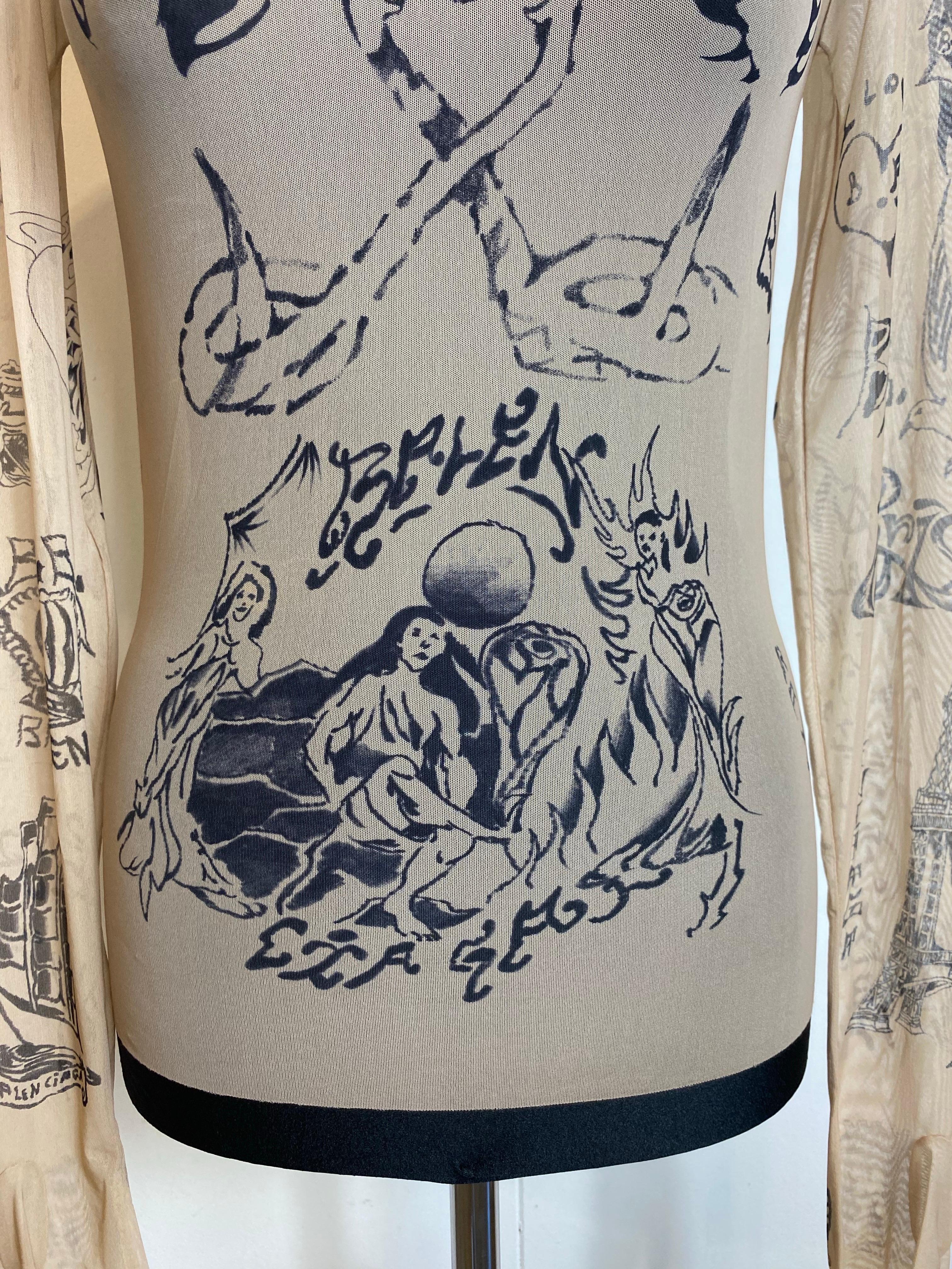 Tatuaje superior Balenciaga.
Colección SS 2024.
No hay etiqueta de composición, pero creemos que es poliamida y elastano.
Falta la etiqueta de la talla, pero se ajusta a una S internacional.
Hombros 40 cm
Busto 38 cm
Longitud 62 cm
Nuevo con